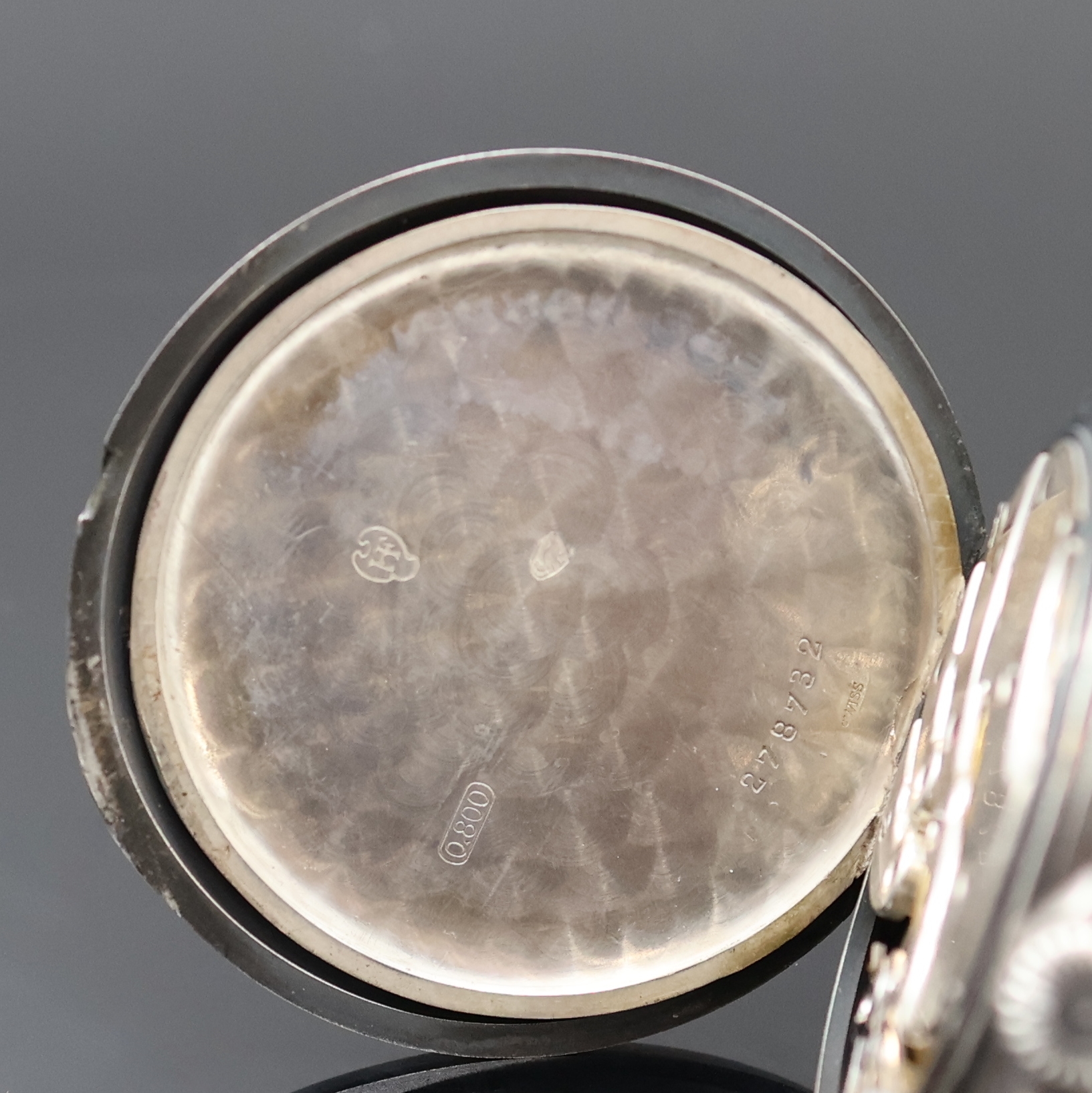 Detail d: ULYSSE NARDIN offene Silbertaschenuhr, Schweiz um 1920, geschw. Silbergeh., sign. Silbercuvette, 2-tlg. Emailzifferbl. riss./besch., Leuchtzahlen u. ...