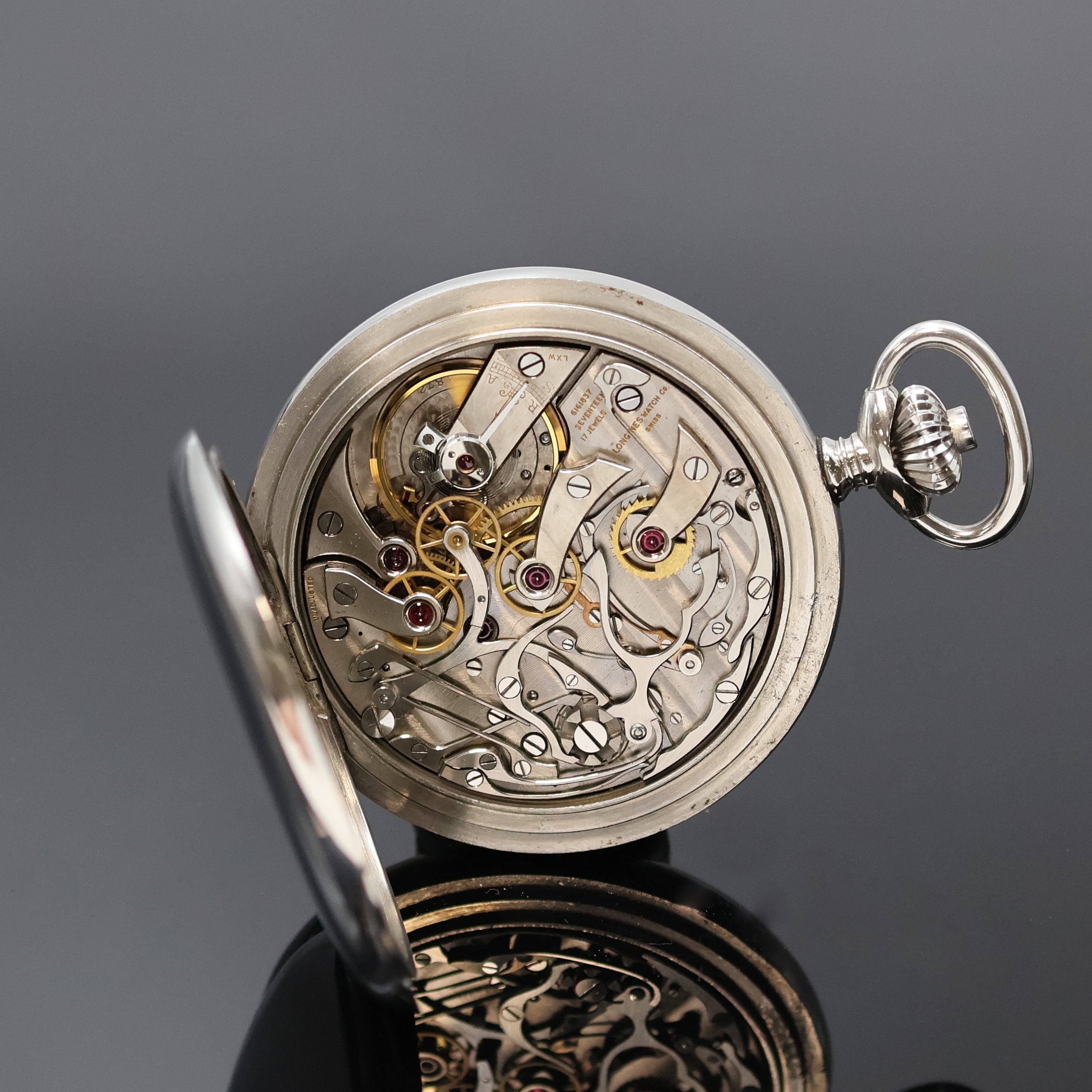 Detail e: LONGINES offene Taschenuhr mit Chronograph in Stahl, Schweiz um 1941, pol. Scharniergeh., Glasrand aufgedr., Stopp-Funktion über Kronendrücker, ...