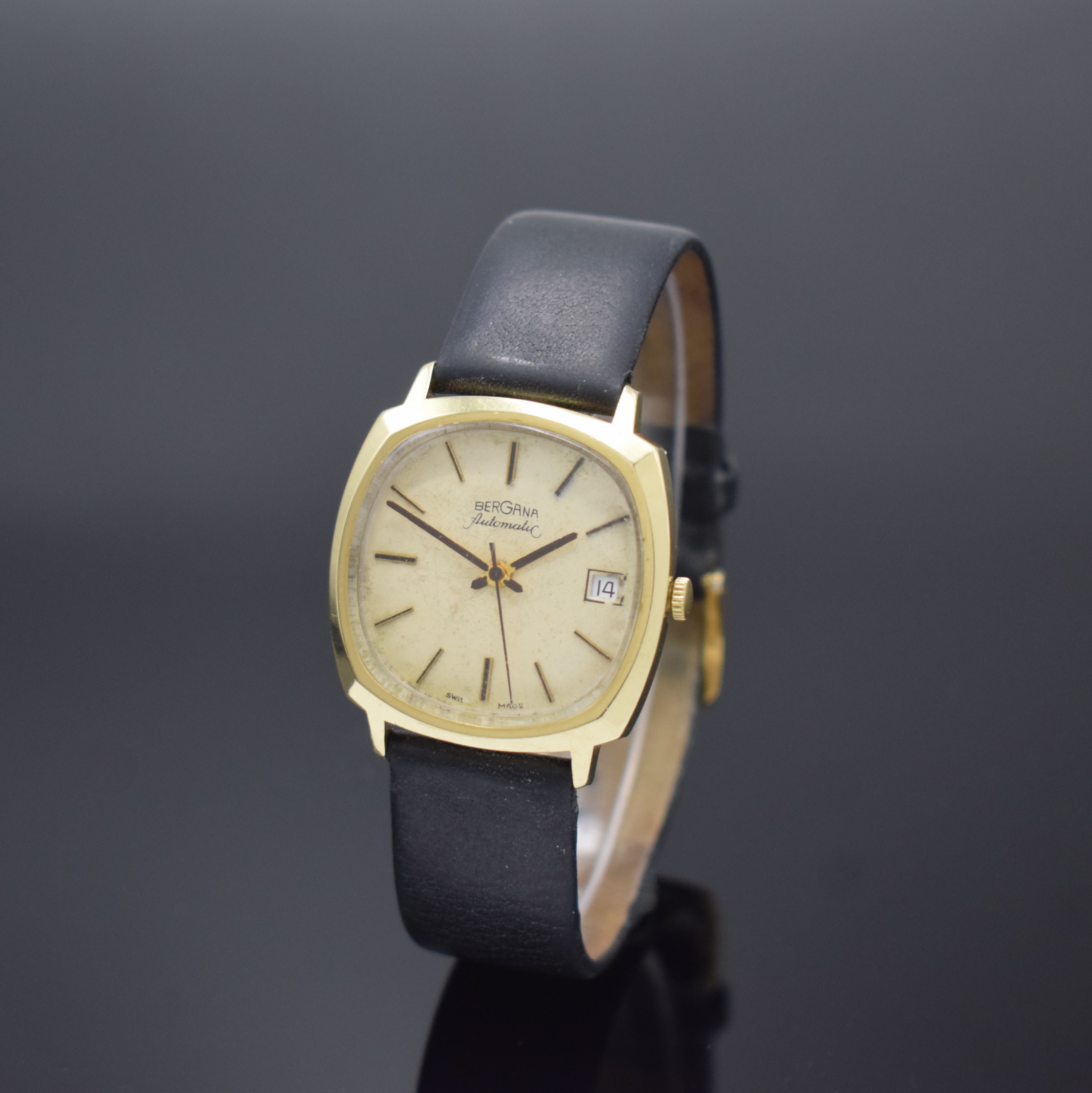 BERGANA Herrenarmbanduhr in GG 585/000, Schweiz um 1970, umgebaut auf quartz, Kissen- förm. Geh., Boden aufgedr., silb. Zifferbl. pat., Datum b. 3, ...