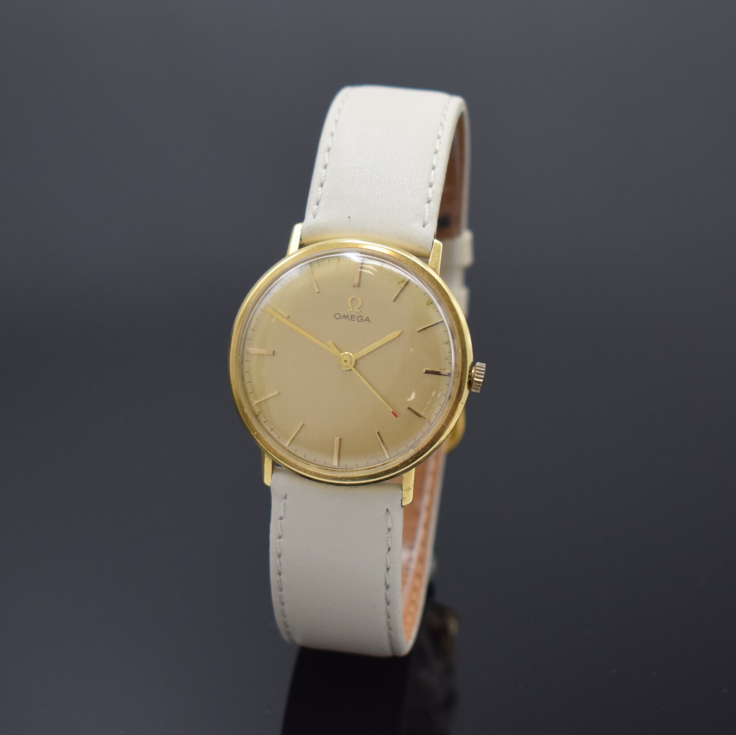 OMEGA Armbanduhr Referenz 131016 in GG 750/000, Schweiz um 1965, Handaufzug, 2-tlg. Geh., Boden aufgedr., gold. Zifferbl., aufges. gold. Indizes, ...