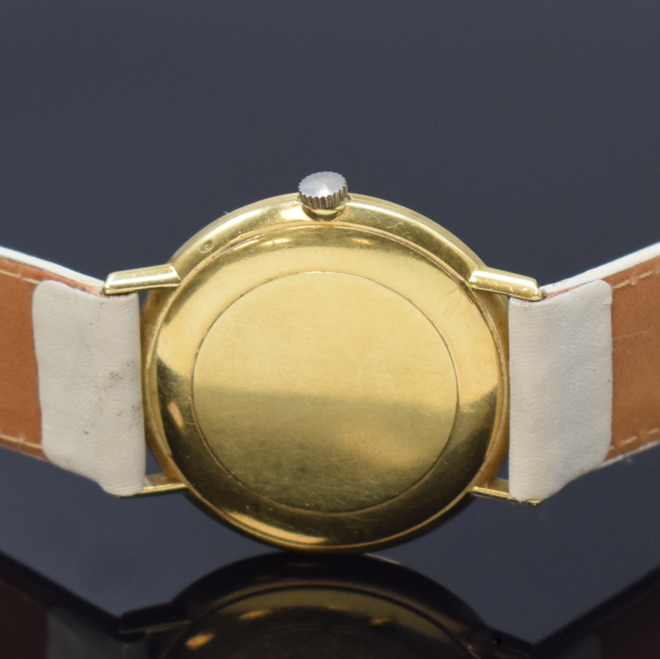 Detail c: OMEGA Armbanduhr Referenz 131016 in GG 750/000, Schweiz um 1965, Handaufzug, 2-tlg. Geh., Boden aufgedr., gold. Zifferbl., aufges. gold. Indizes, ...