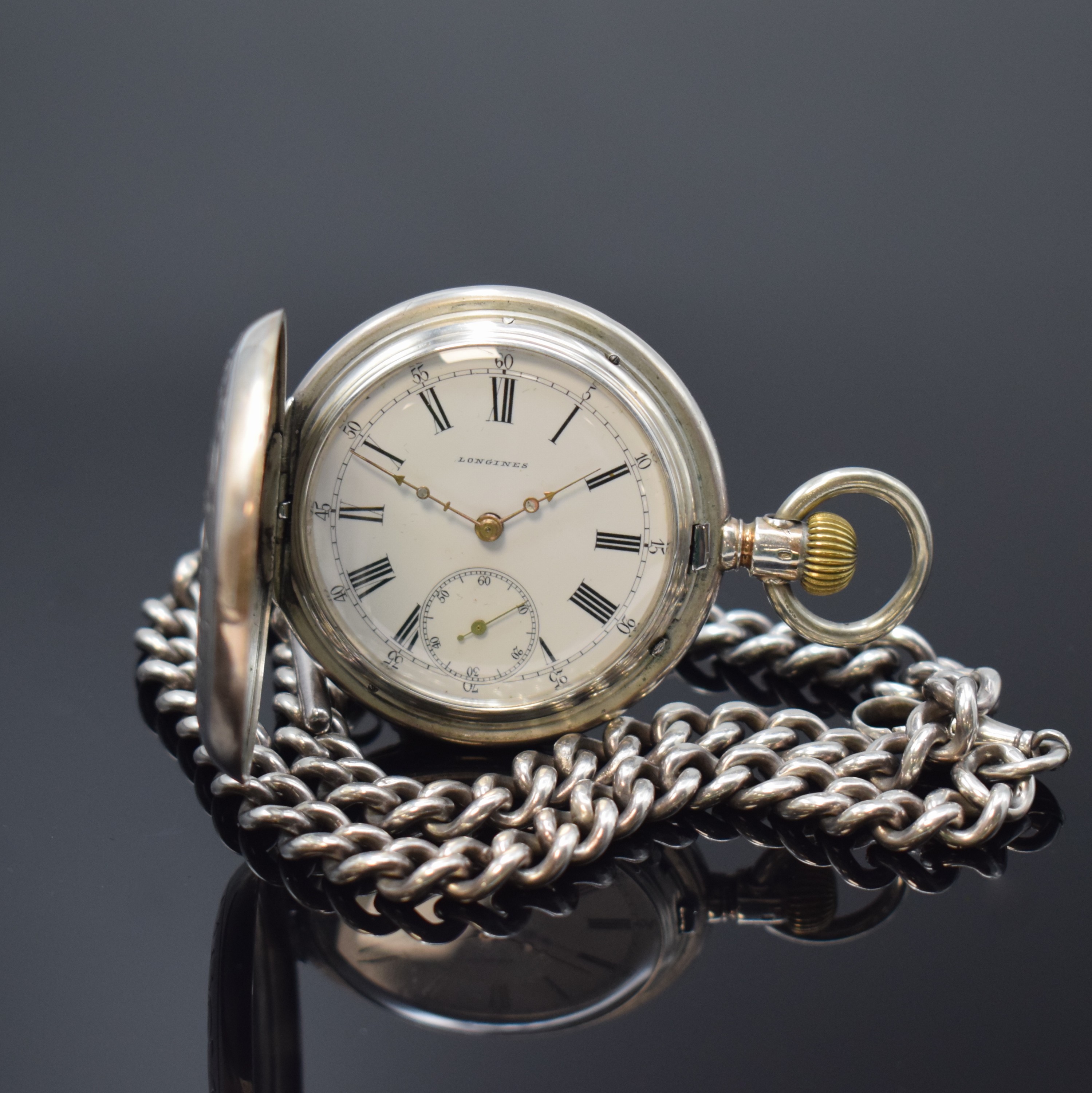 LONGINES frühe Halbsavonette in Silber an schwerer Sterling-Silberkette, Schweiz um 1885, floral grav. Geh., sign., teil-guill. Cuvette, Innenseite ...