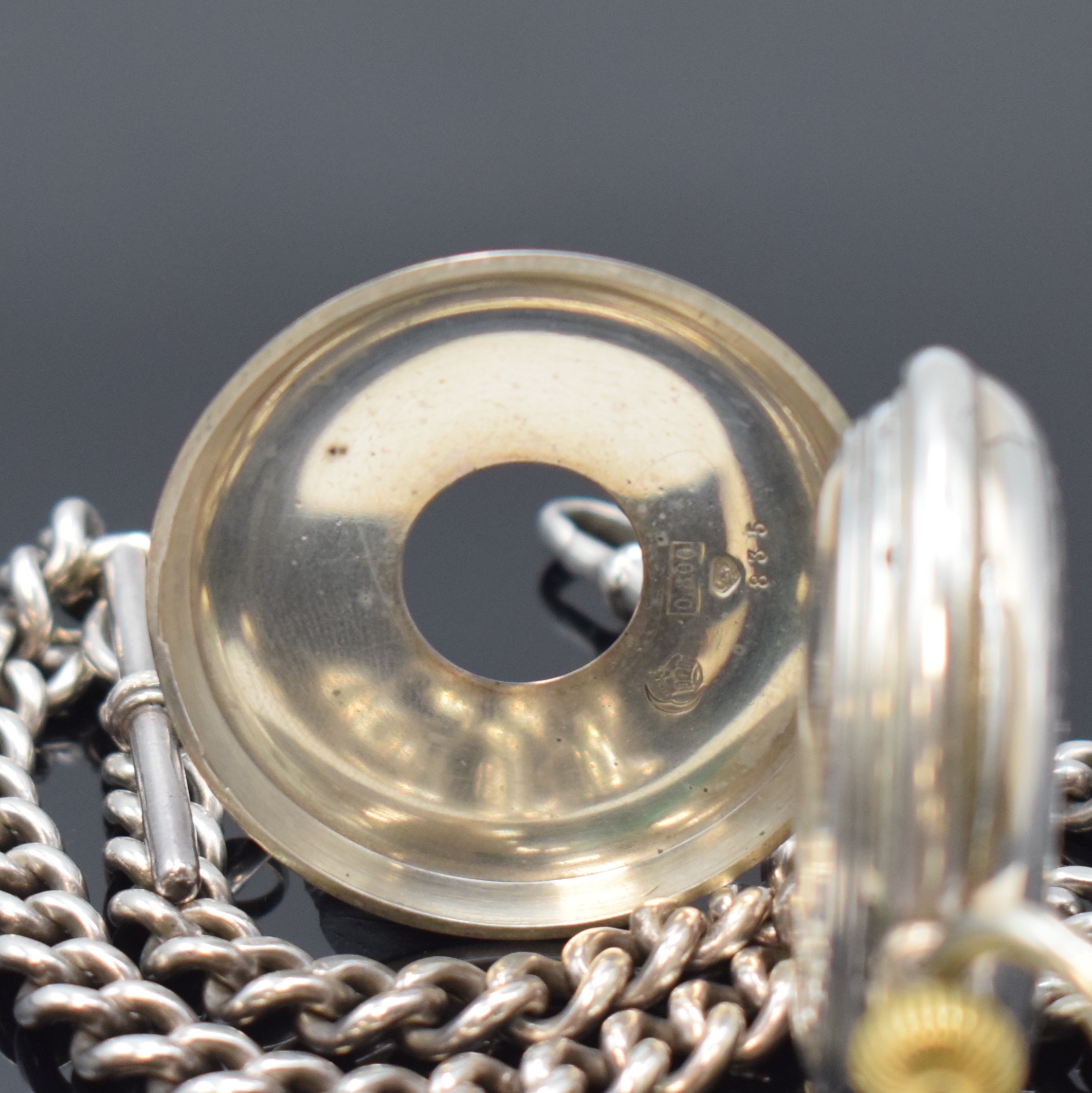 Detail a: LONGINES frühe Halbsavonette in Silber an schwerer Sterling-Silberkette, Schweiz um 1885, floral grav. Geh., sign., teil-guill. Cuvette, Innenseite ...
