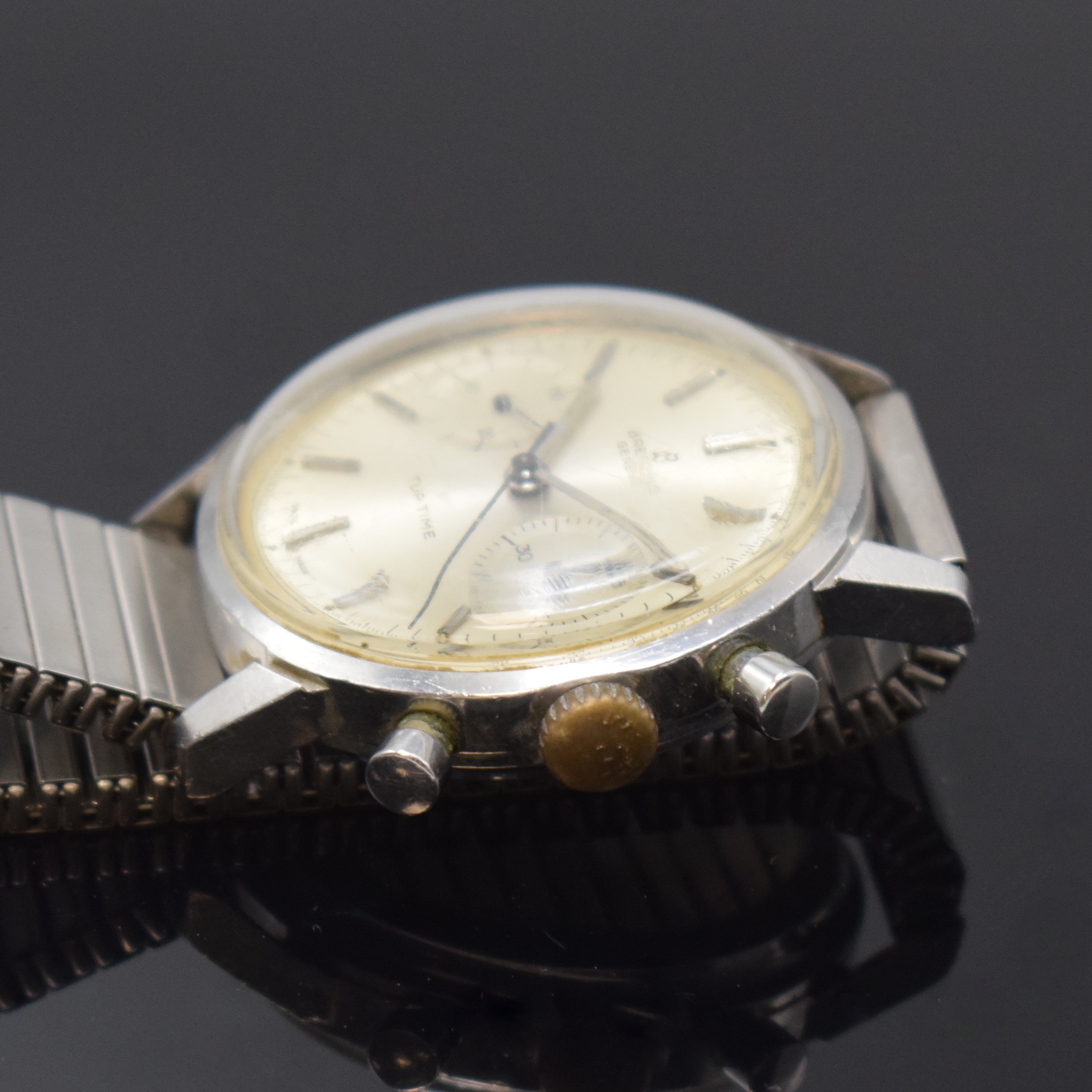 Detail b: BREITLING Armbandchronograph TOP TIME Referenz 2002, Schweiz um 1960, Handaufzug, Edelstahl-Einschalengeh., neutr. Flexband, 17 St., Basiskal. Venus ...