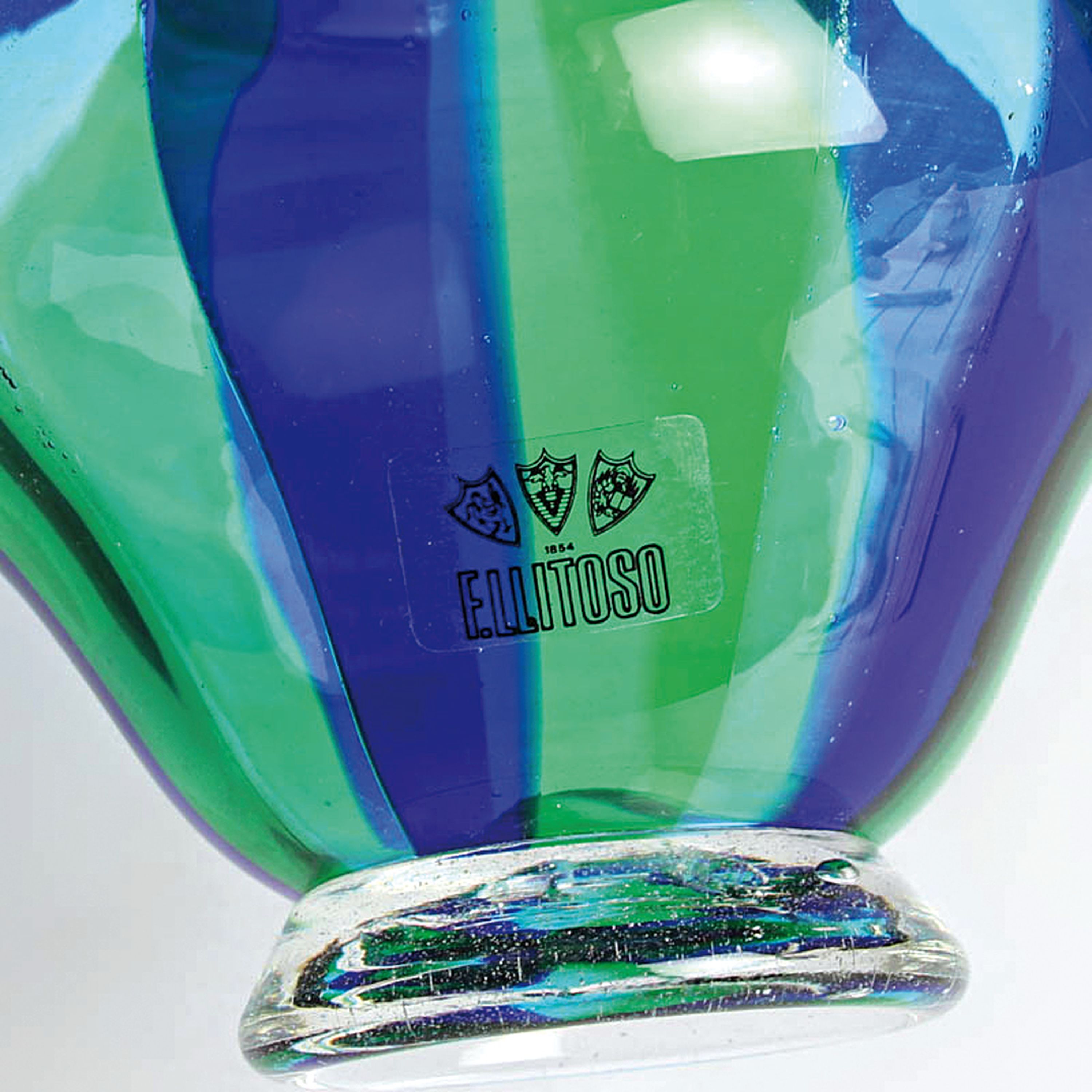 Detail c: 2 a canne bzw. zanfirico-Vasen, Fratelli Toso, Murano, 1960-70, Henkelvase mit gedrehten gelb cannes H. 20 cm; gestufte Vase mit grünen und blauen ...