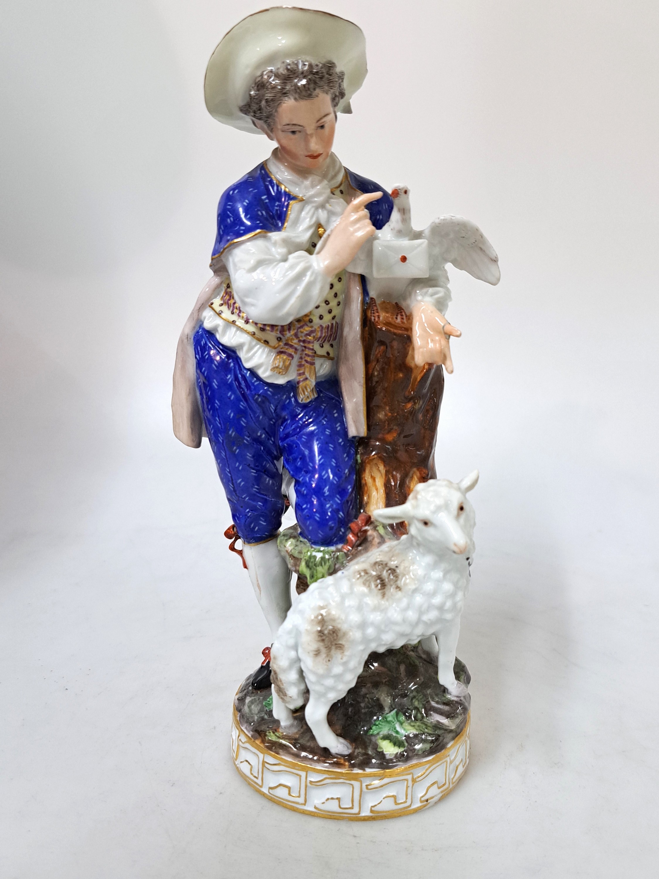 Detail a: Porzellanfigur, Meissen, 1774-1814, Schäfer mit Brieftaube, polychrom bemalt, Fehlstelle an Hutschleife und geklebt bzw. min. rest. an den Fingern, ...