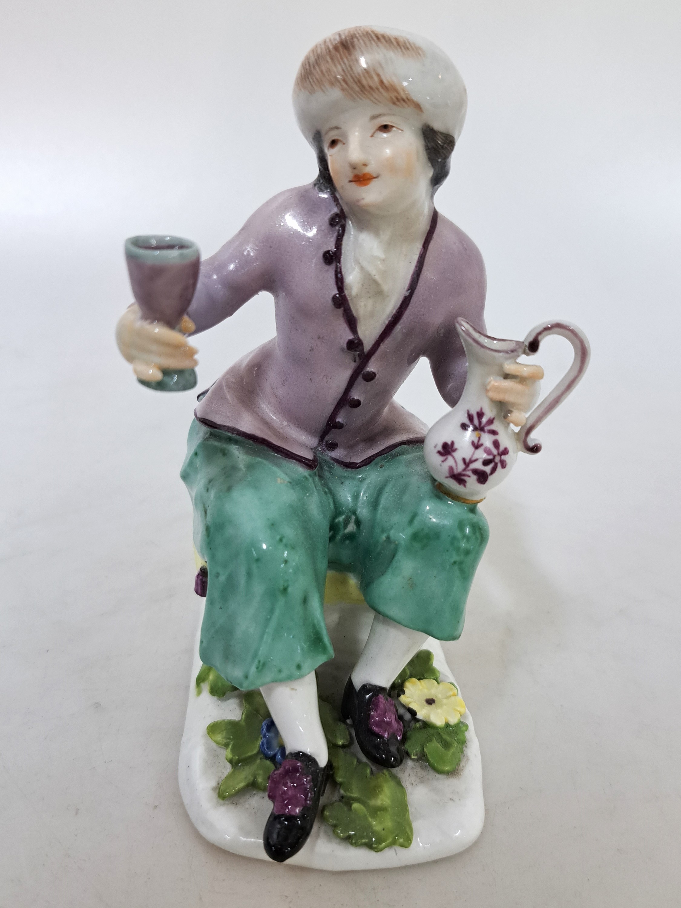 Detail a: Porzellanfigur, Meisen, um 1745, Russischer Bauer, Modell J.J. Kaendler, polychrom bemalt, Fladensockel mit aufgelegten Blümchen, l. rest., min. ...