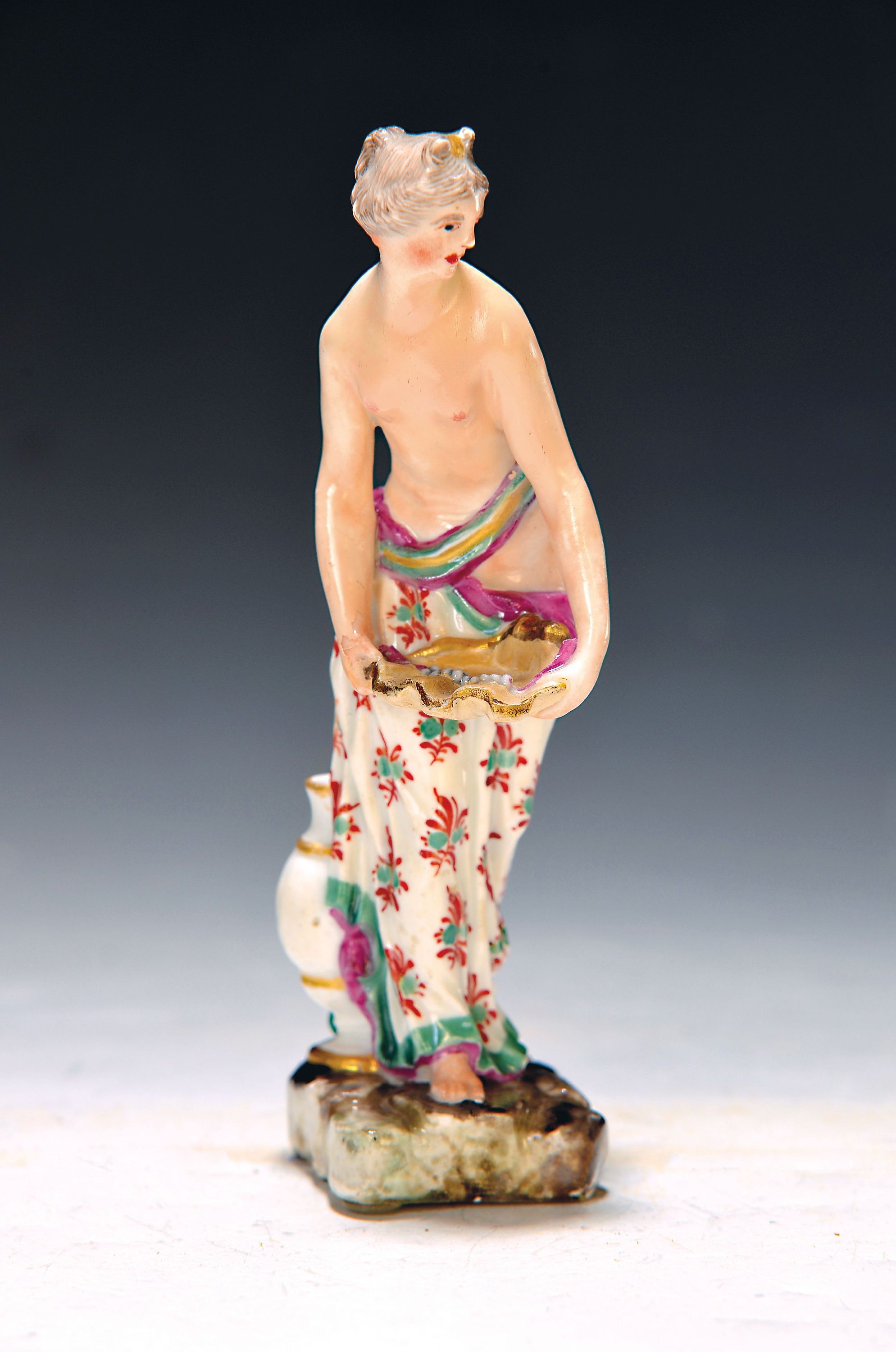 Porzellanfigur, Najade, Ludwigsburg, um 1770, Entwurf Joseph Nees, Nymphe mit Muschelschale und Perlenschnur, bemalt, restauriert, H. ca. 14 cm