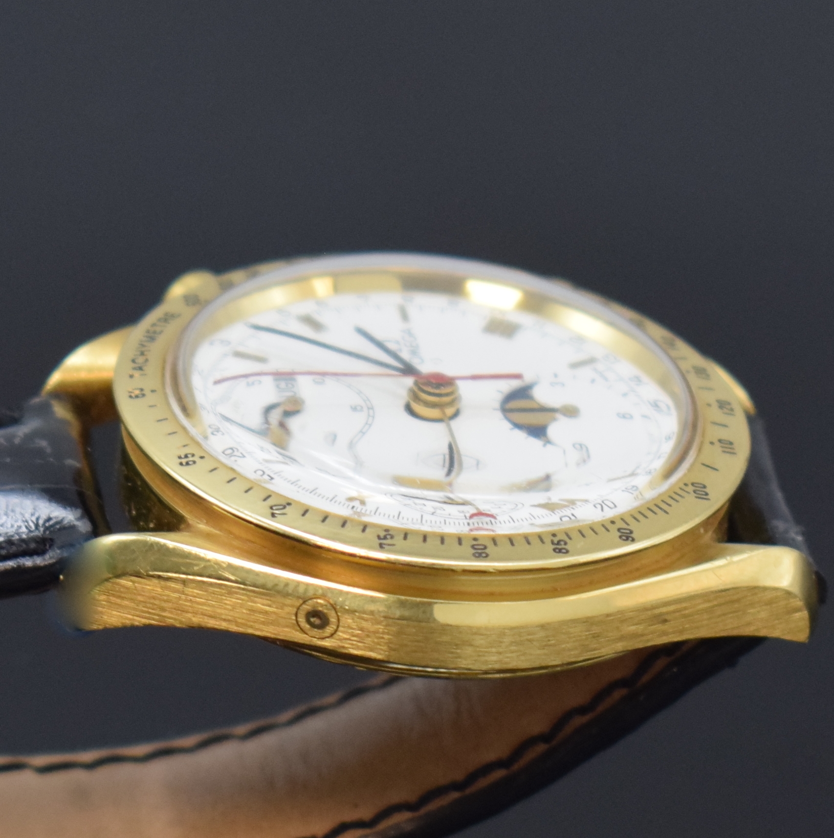 Detail f: OMEGA astronomische Herrenarmbanduhr Golden Gate Chronograph mit Vollkalenderanzeige in GG 750/000 Referenz 175.0034, Automatik, Schweiz um 1990, ...