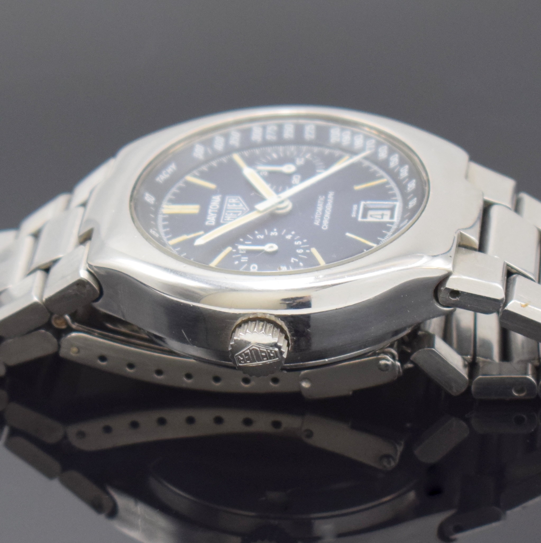 Detail b: HEUER Daytona Armbandchronograph Referenz 110203B, Schweiz 1970er Jahre, Automatik, Edelstahlgeh. inkl. Gliederband m. Faltschl., Boden verschr., ...