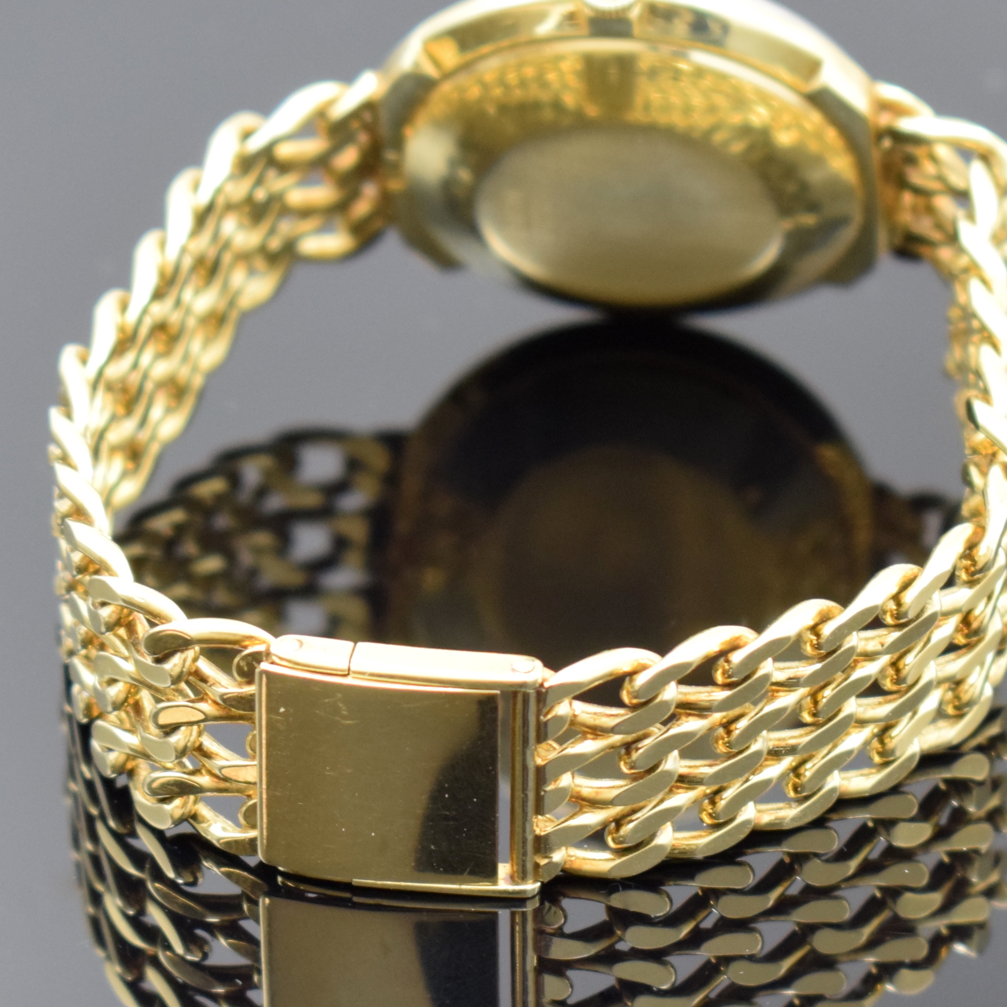 Detail b: JUNGHANS Herrenarmbanduhr in GG 585/000 an neutralem GG 585/000 Gliederband, Automatik, Deutschland Ende 1960er Jahre, mit ETA Basiskal. 2451, für ...