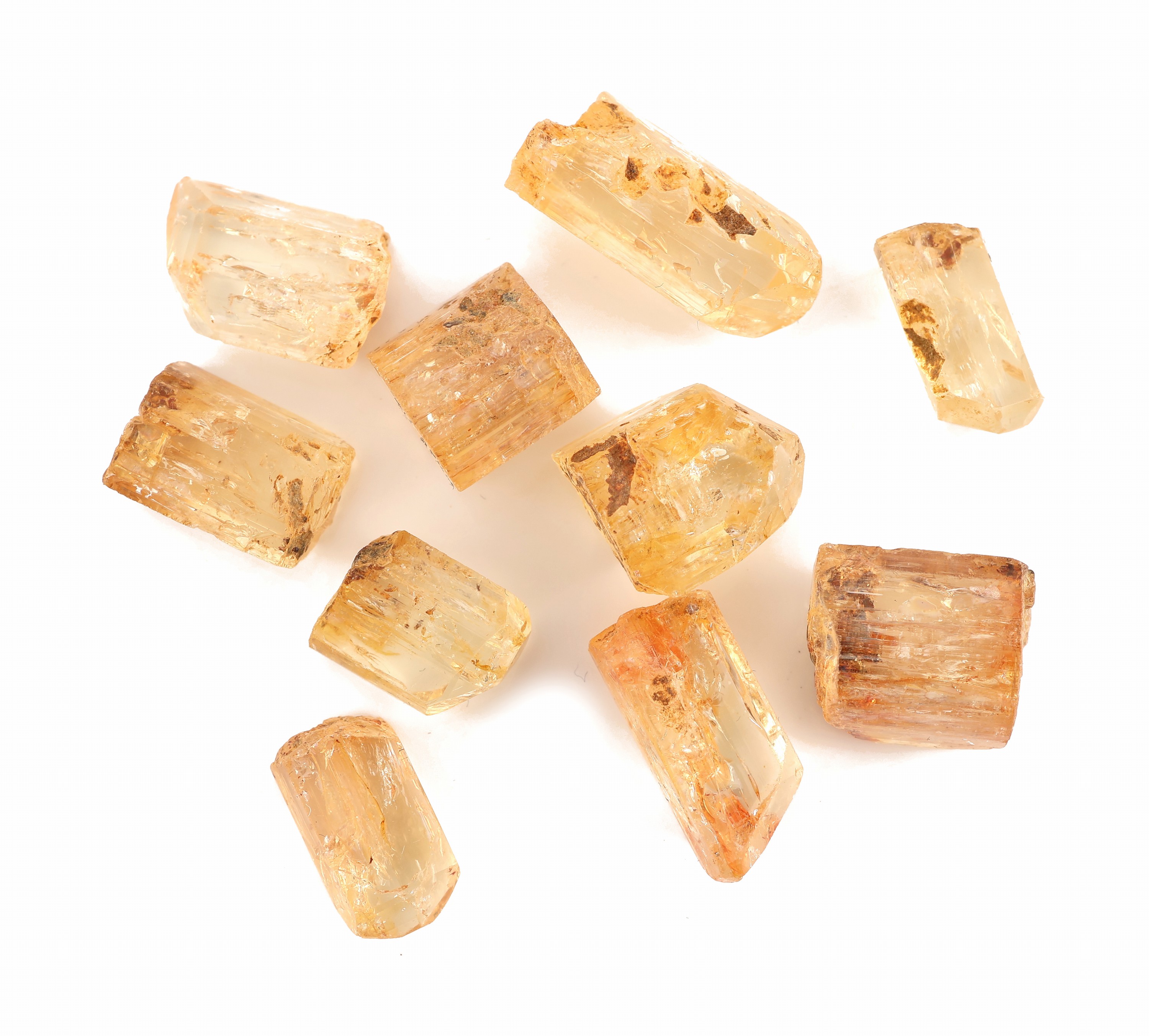 Detail a: Lot 10 lose Imperialtopas-Rohsteine, zus. ca. 98.81 ct, versch. Größen, Formen und Farbnuancen