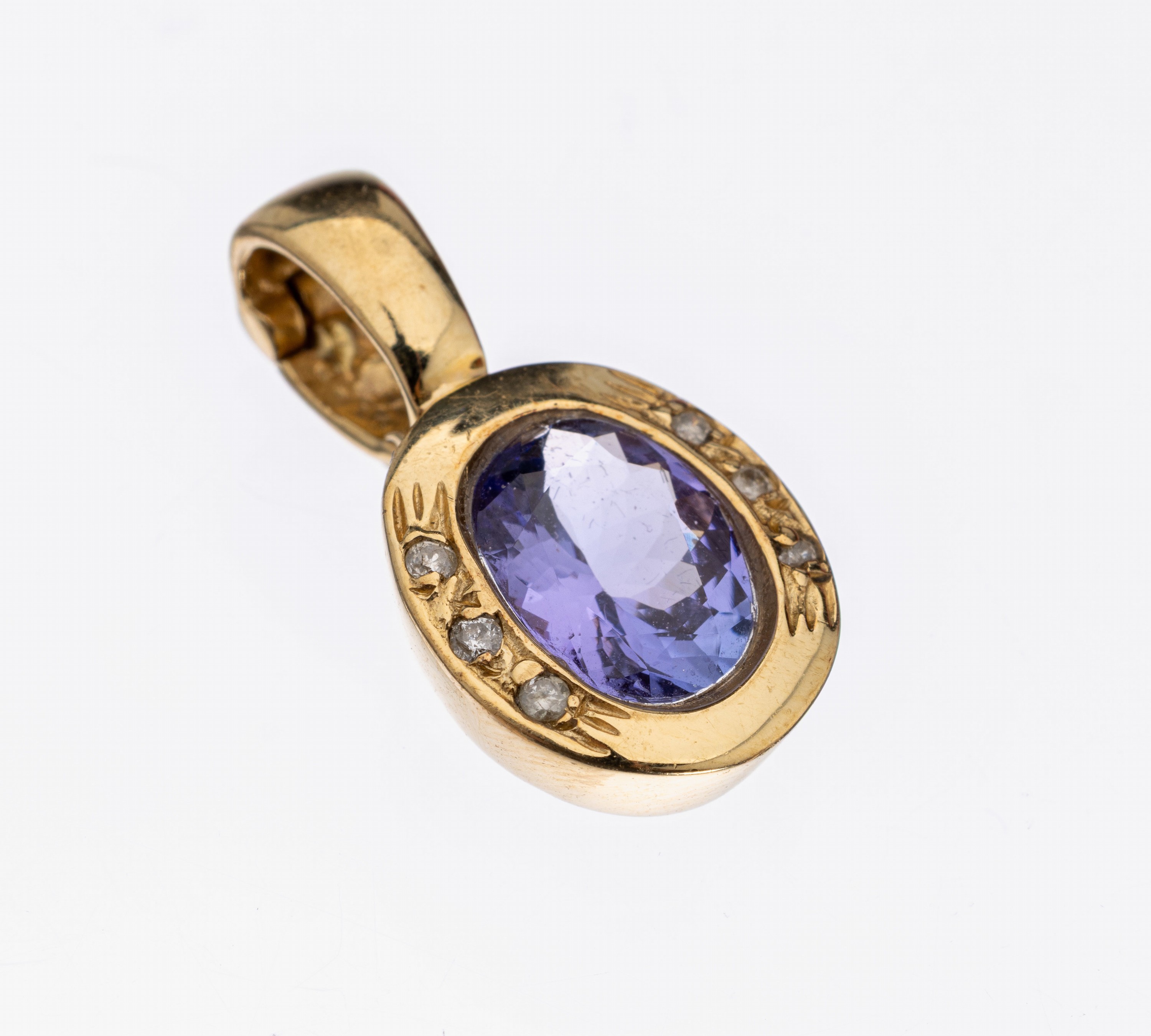 14 kt Gold Tansanit-Brillant-Clipanhänger, GG 585/000, ovalfacett. Tansanit ca. 1.0 ct, 6Brillanten zus. ca. 0.06 ct Weiß/si-p, ca. 2.9g, ca. 2.1 ...