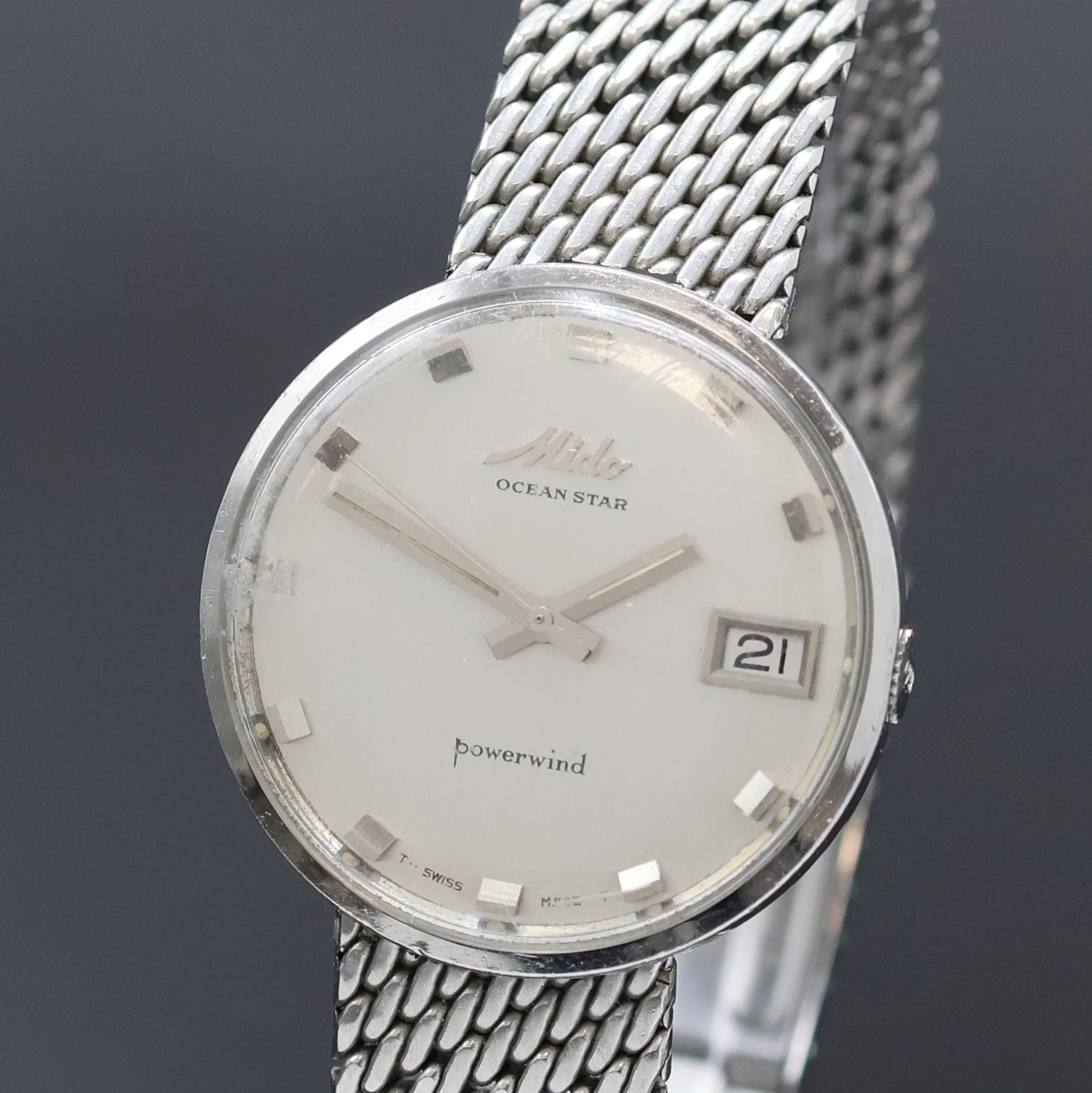 Detail a: MIDO OCEAN STAR powerwind Herrenarmbanduhr in Stahl Referenz 5067, Schweiz um 1970, Automatik, Monocoque-Geh. m. integr. Milanaiseband, silb. ...