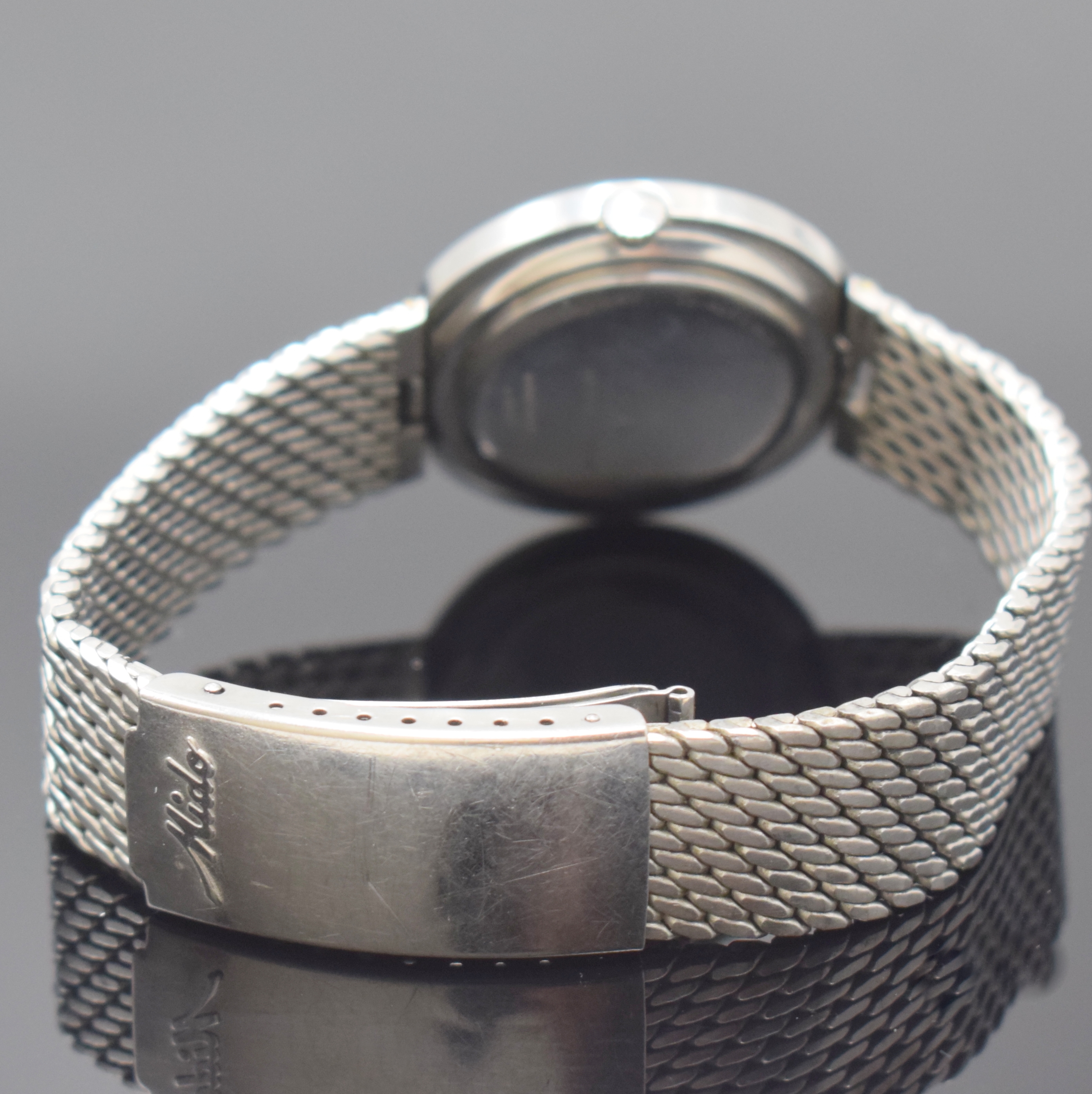 Detail b: MIDO OCEAN STAR powerwind Herrenarmbanduhr in Stahl Referenz 5067, Schweiz um 1970, Automatik, Monocoque-Geh. m. integr. Milanaiseband, silb. ...