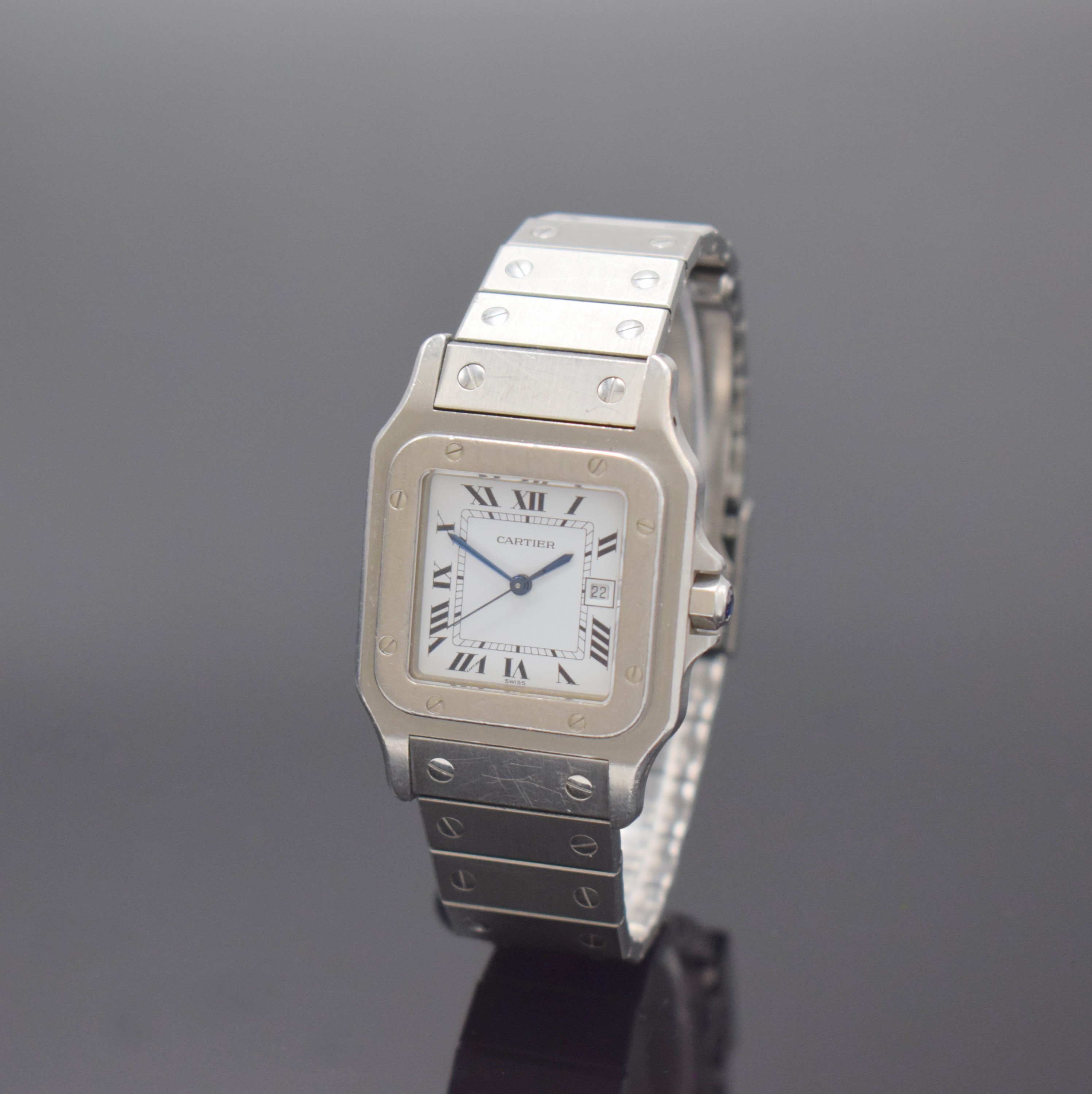 CARTIER Santos Armbanduhr in Stahl, Schweiz um 1985, Automatik, 8-fach über Lünette verschr. Geh. inkl. Gliederband m. Faltschl., Krone m. ...