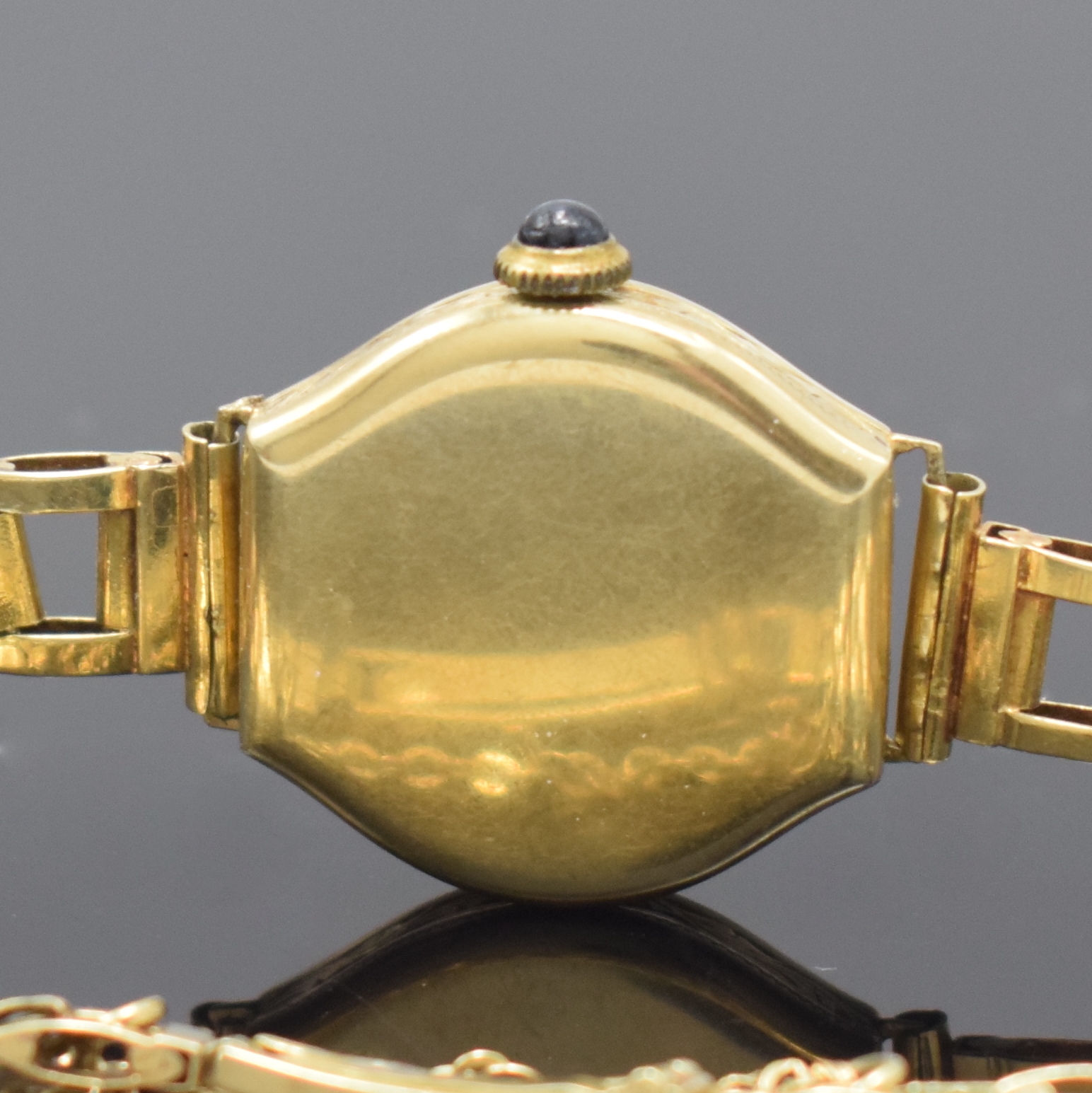 Detail d: ANKRA Damenarmbanduhr in GG 585/000 am original Goldband, Deutschland um 1925, Handaufzug, tonneauförm. Scharniergeh. seitl. grav., abnehmbares ...