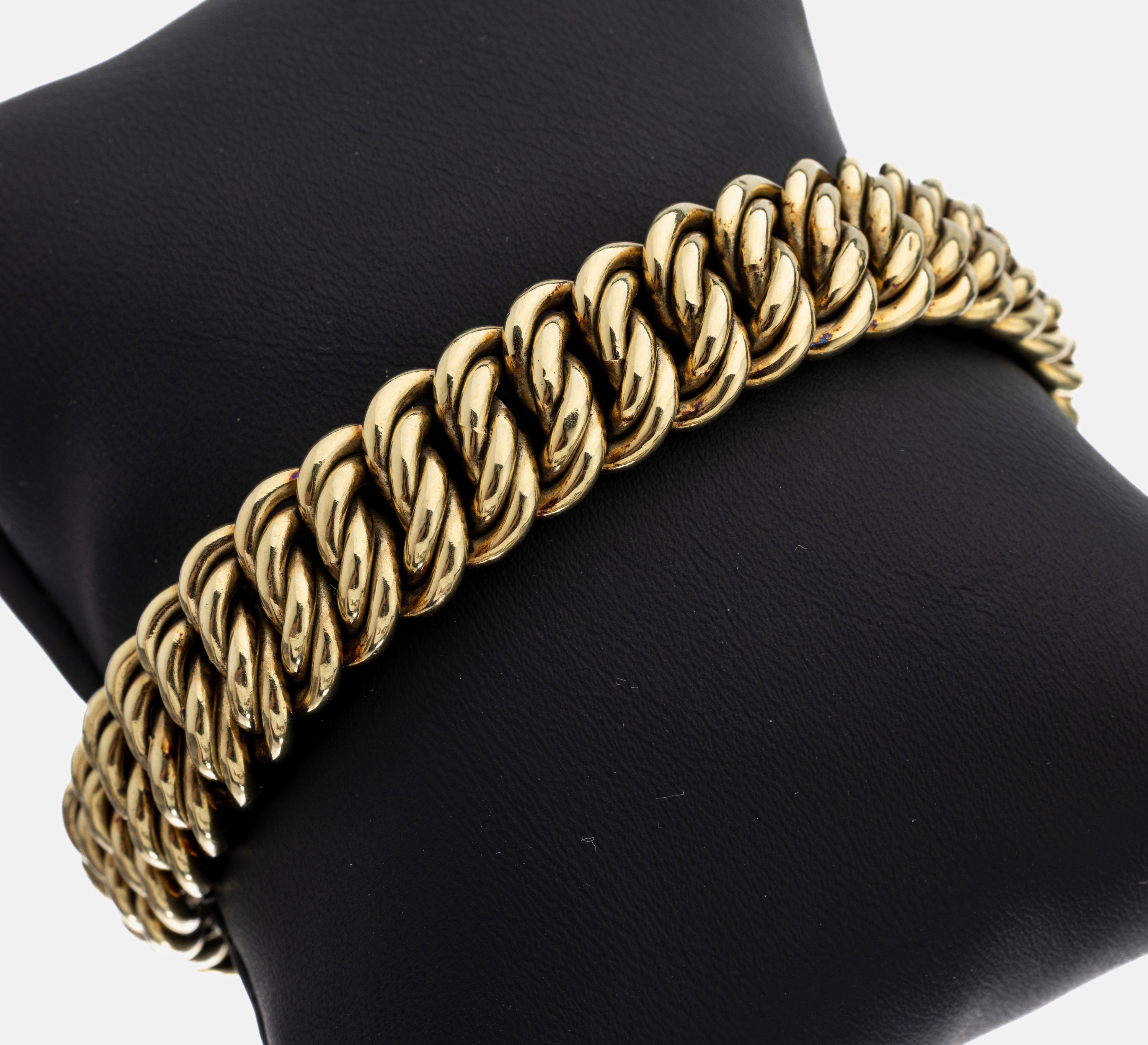 14 kt Gold Armband, GG 585/000, ineinander verschlungene Ösen, B. ca. 1.3 cm, L. ca. 20 cm, Kastenschloss mit 2 Sicherheitsachten, ca.25.0 g