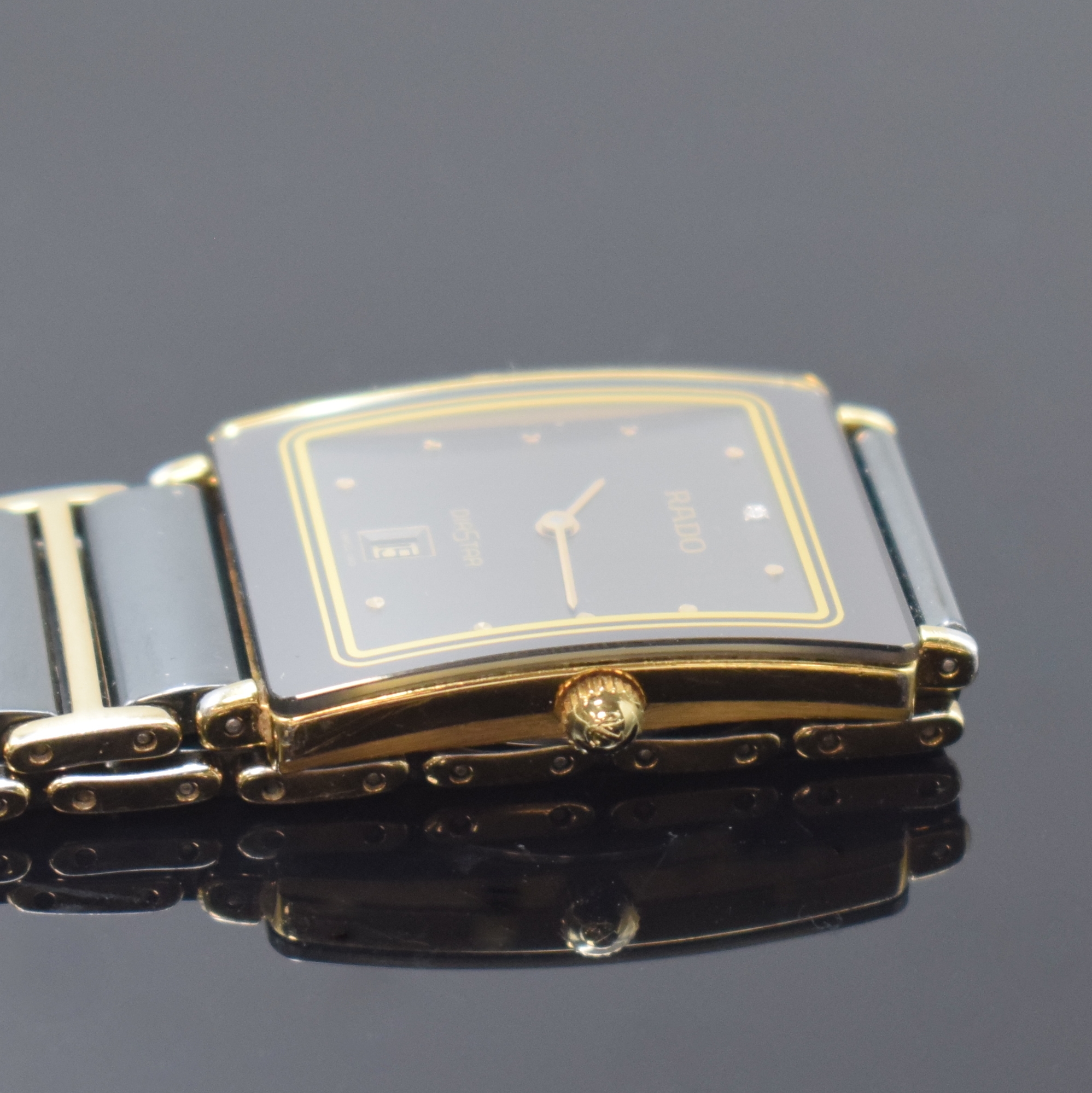 Detail c: RADO Diastar Armbanduhr Referenz 160.0281.3N, Schweiz um 1995, quarz, verg. Geh. inkl. orig. Keramikband m. verg. Zwischengliedern, dopp. Faltschl. ...