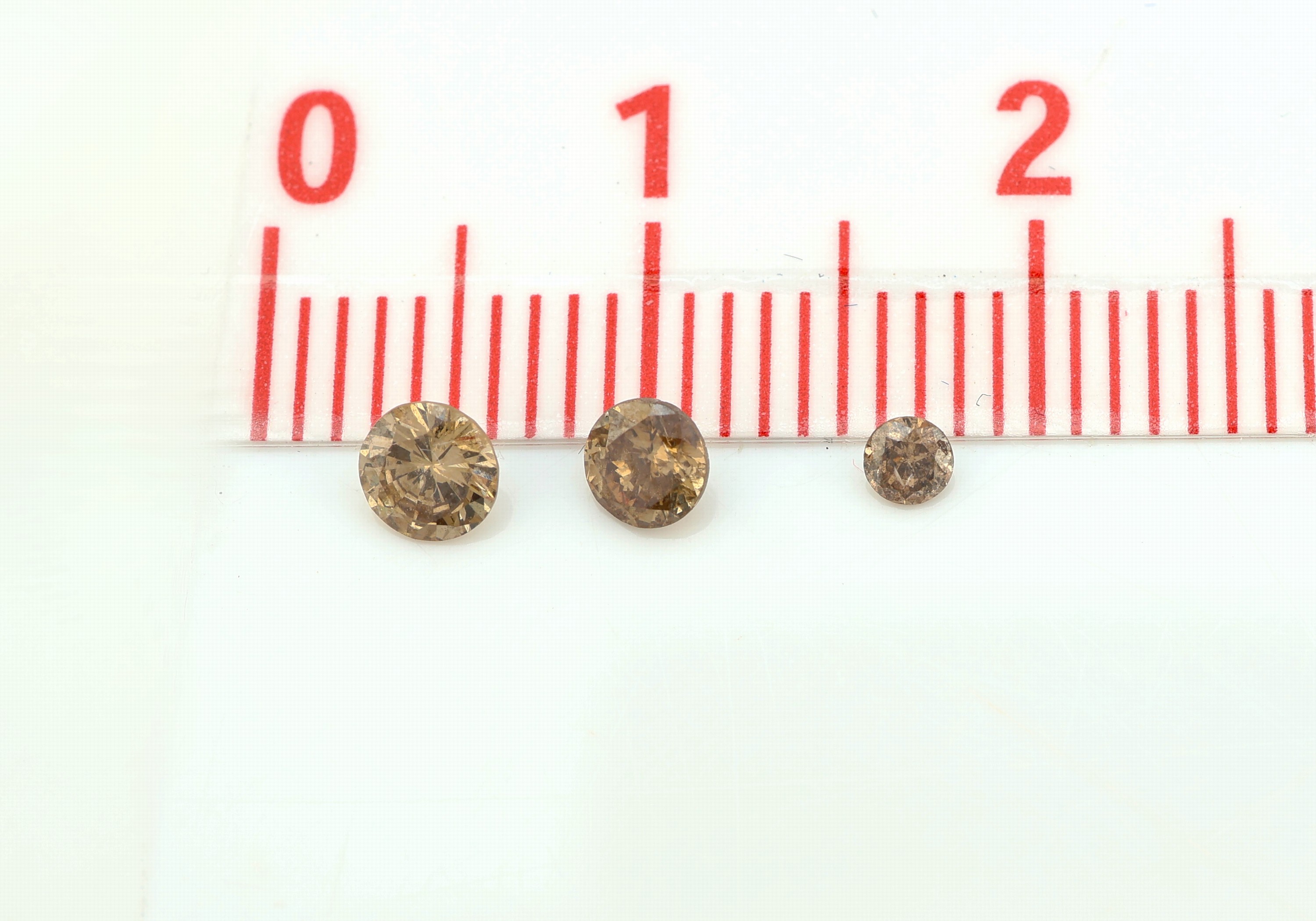 Detail a: Lot lose Brillanten, zus. ca. 3.90 ct Braun/si-p, versch. Größen, Ausfassware
