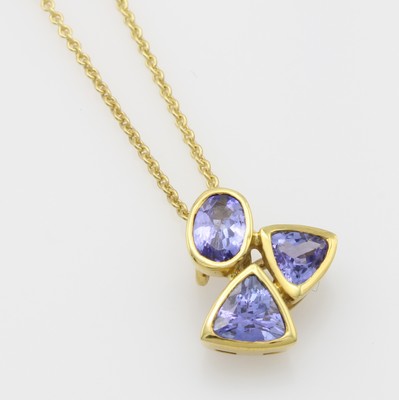Image Anhänger mit Tansaniten an Kette, GG 585/ 000, 3 facett. Tansanite zus. ca. 1.5 ct, ...