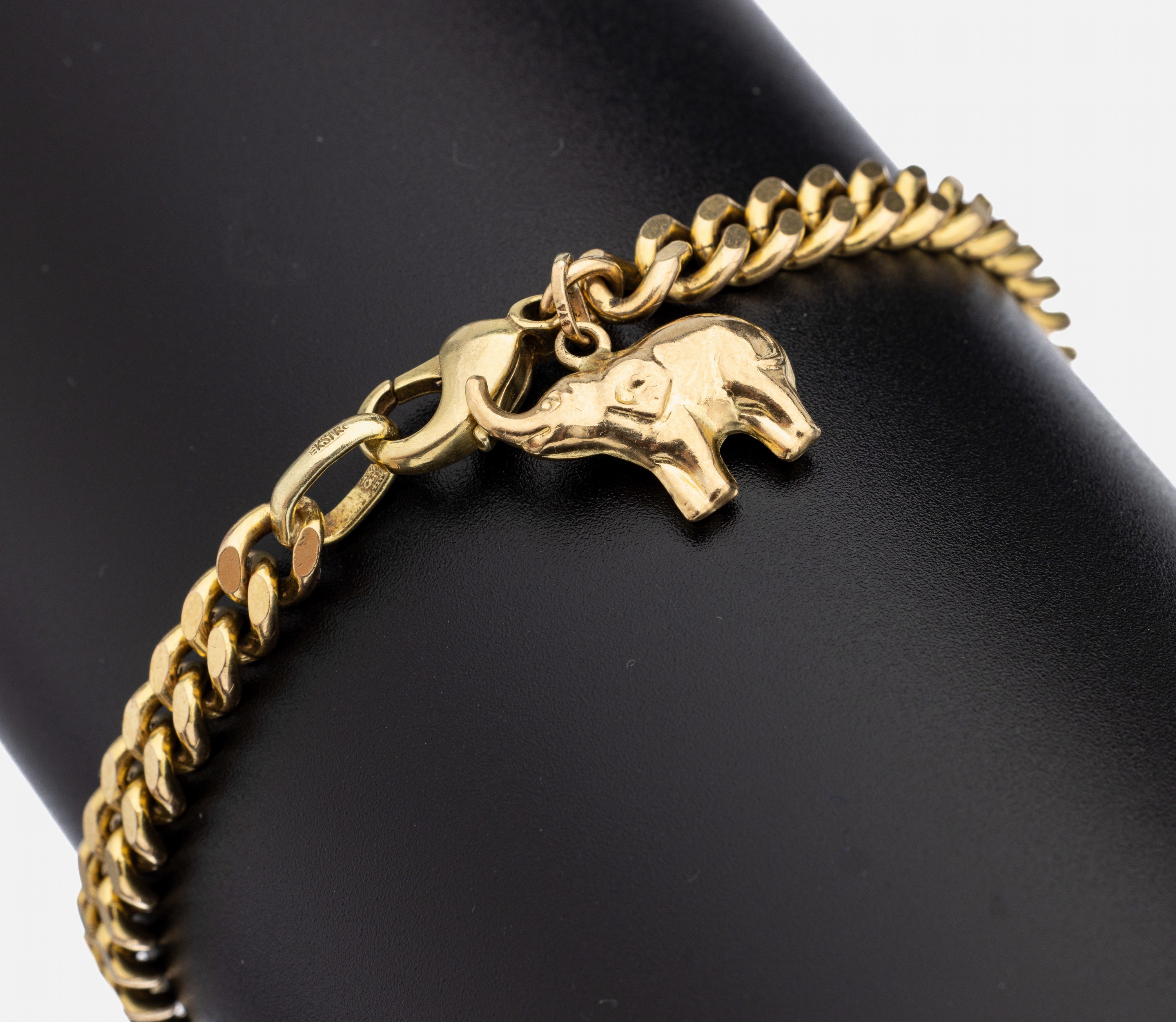 14 kt Gold Armband, GG 585/000, bewegl. Abhängung in Form eines Elefanten, GG 375/000,L. ca. 18.5 cm, Karabinerschließe, ca. 17.2 g