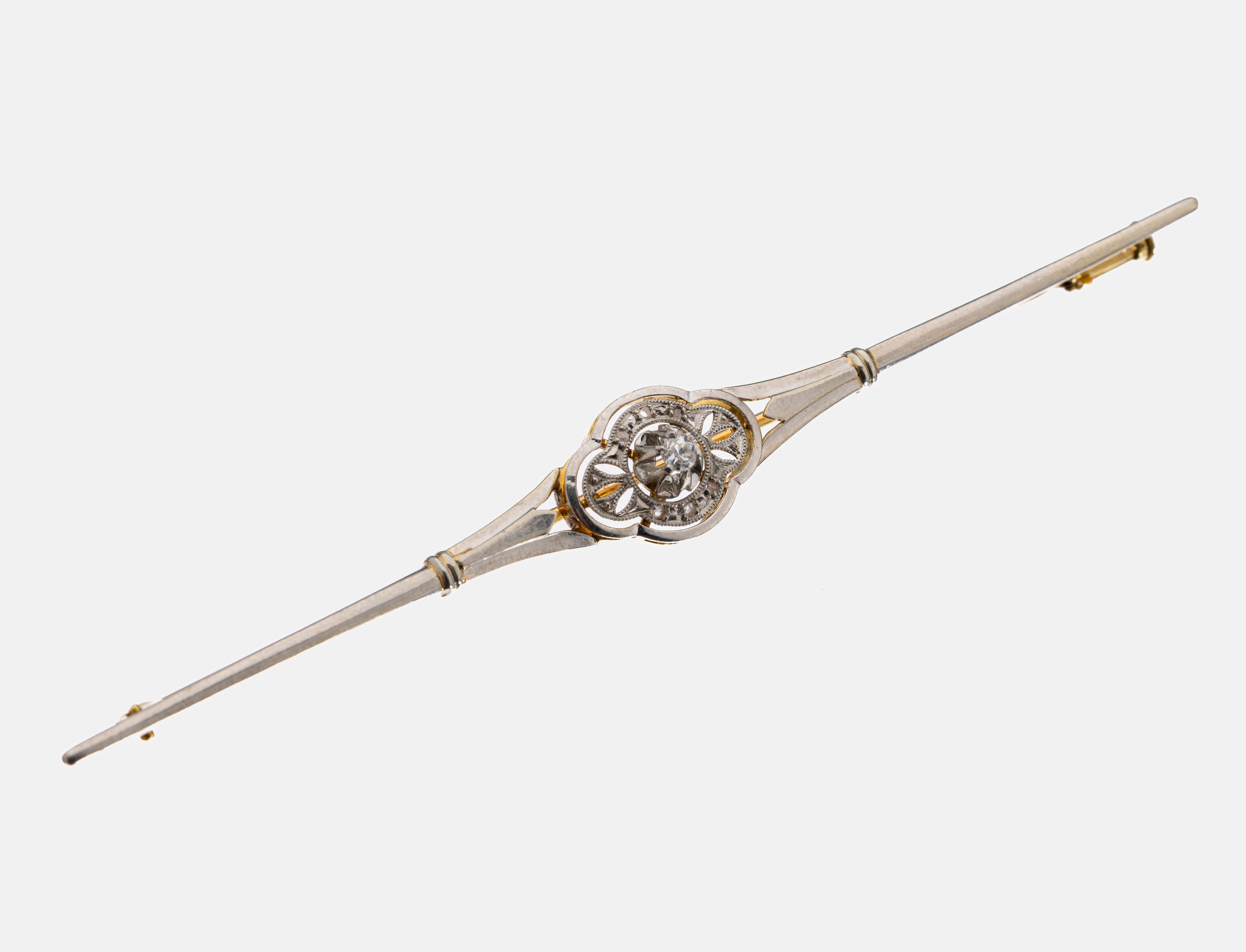 14 kt Gold Diamant-Brosche, um 1930, GG/WG 585/000, wohl Österreich, L. ca. 8.5 cm, Mittelteil mit kl. 8/8-Diamant und Diamantrosen, 1 Dia.-Rose ...