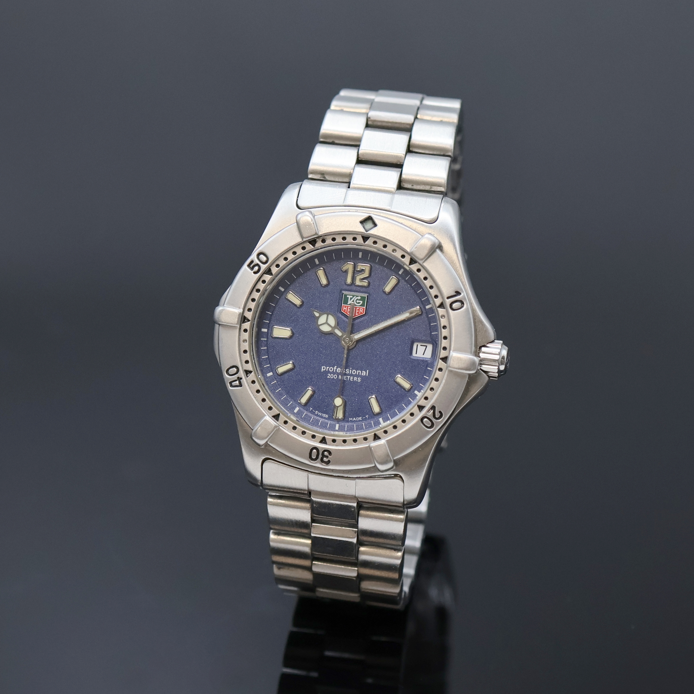 TAG HEUER Professional Armbanduhr in Stahl Referenz WK 1113, Schweiz um 2000, quarz, Lünette m. 60er-Teilung, eins. drehb., Boden u. Krone verschr., ...