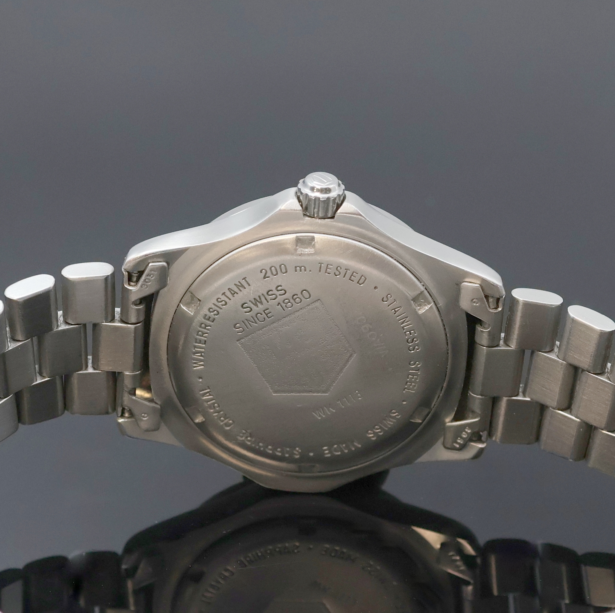 Detail d: TAG HEUER Professional Armbanduhr in Stahl Referenz WK 1113, Schweiz um 2000, quarz, Lünette m. 60er-Teilung, eins. drehb., Boden u. Krone verschr., ...