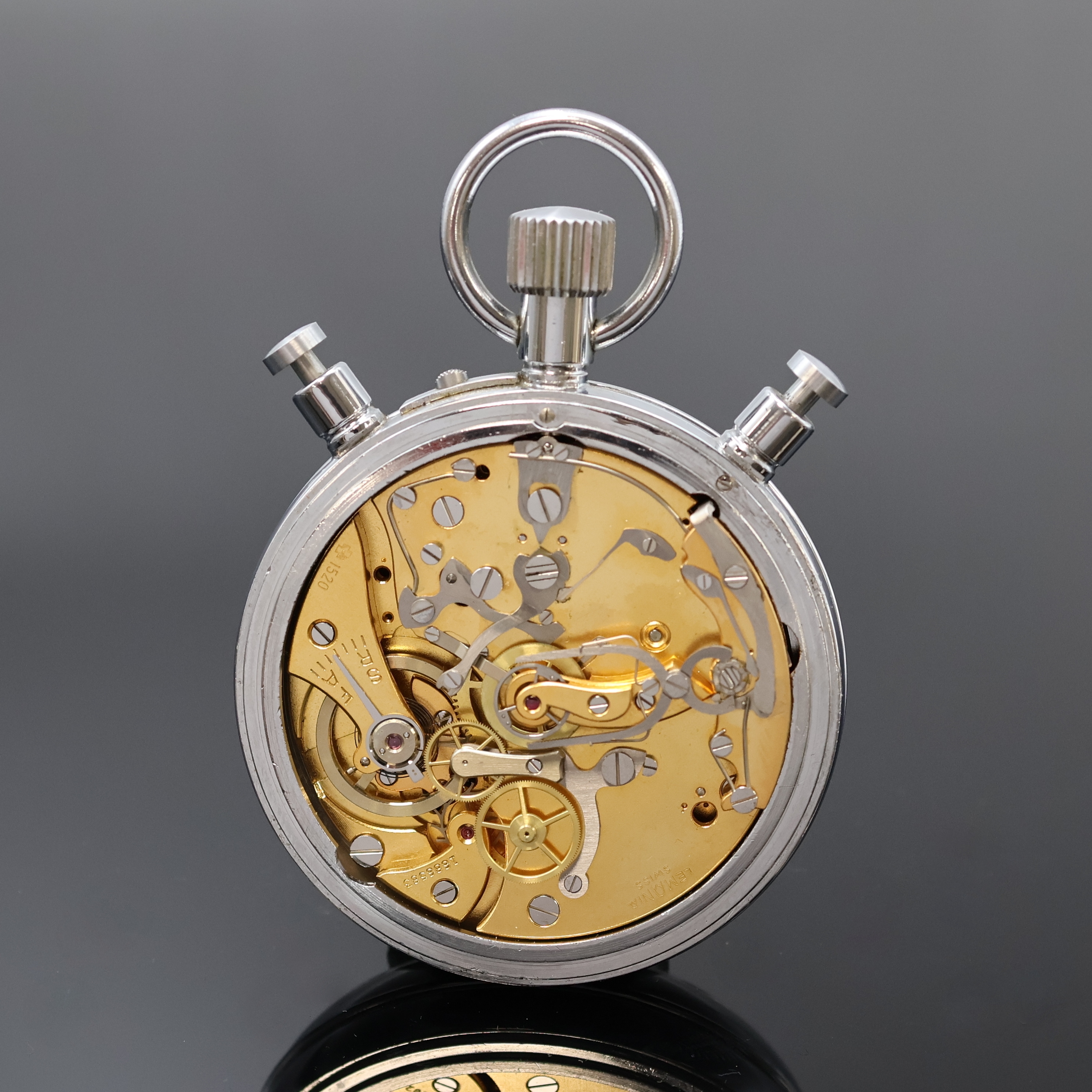 Detail b: ANDREAS HUBER München 22 / LEMANIA seltene Alleszähler-Stoppuhr mit Rattrapante und Flyback, Schweiz/Deutschland um 1965, verchr. Geh., Boden u. ...