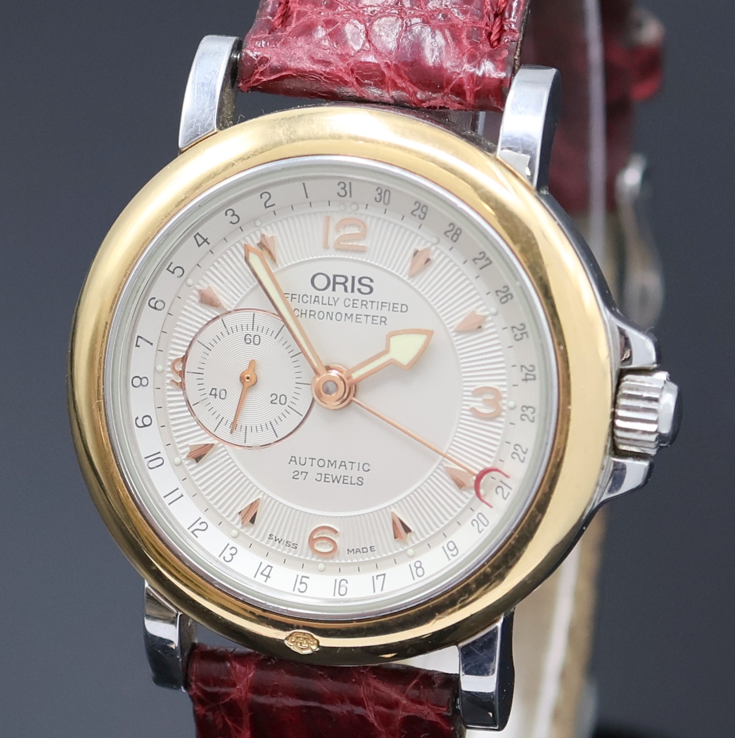 Detail a: ORIS Armbandchronometer Referenz 7467B, Schweiz um 1990, Automatik, beids. vergl., Krone verschr., Lederband m. orig. Dornschl., Saphirglas, silb. ...