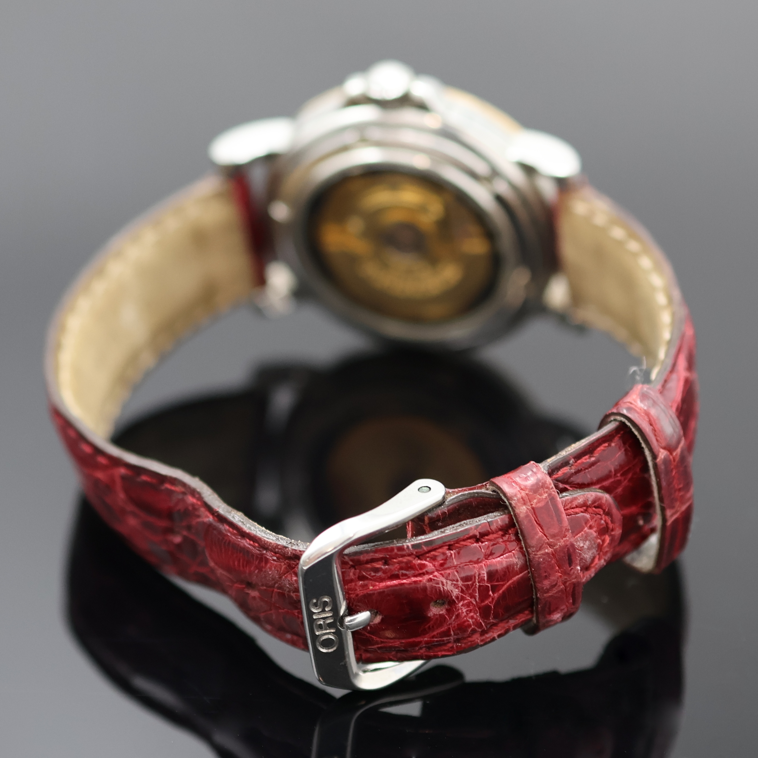 Detail b: ORIS Armbandchronometer Referenz 7467B, Schweiz um 1990, Automatik, beids. vergl., Krone verschr., Lederband m. orig. Dornschl., Saphirglas, silb. ...