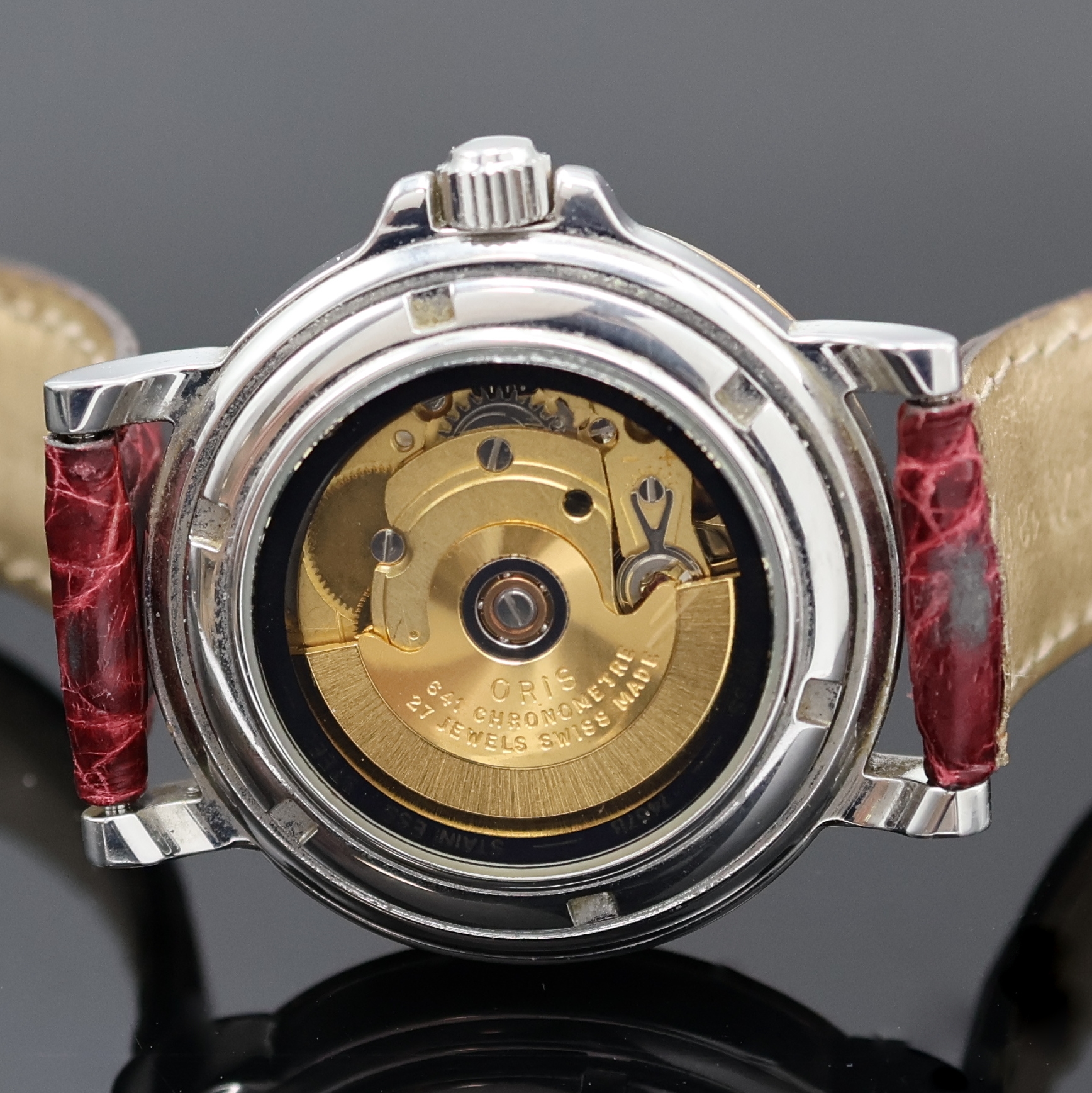 Detail d: ORIS Armbandchronometer Referenz 7467B, Schweiz um 1990, Automatik, beids. vergl., Krone verschr., Lederband m. orig. Dornschl., Saphirglas, silb. ...