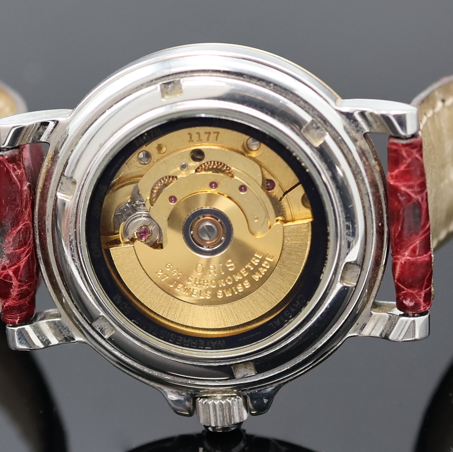 Detail e: ORIS Armbandchronometer Referenz 7467B, Schweiz um 1990, Automatik, beids. vergl., Krone verschr., Lederband m. orig. Dornschl., Saphirglas, silb. ...