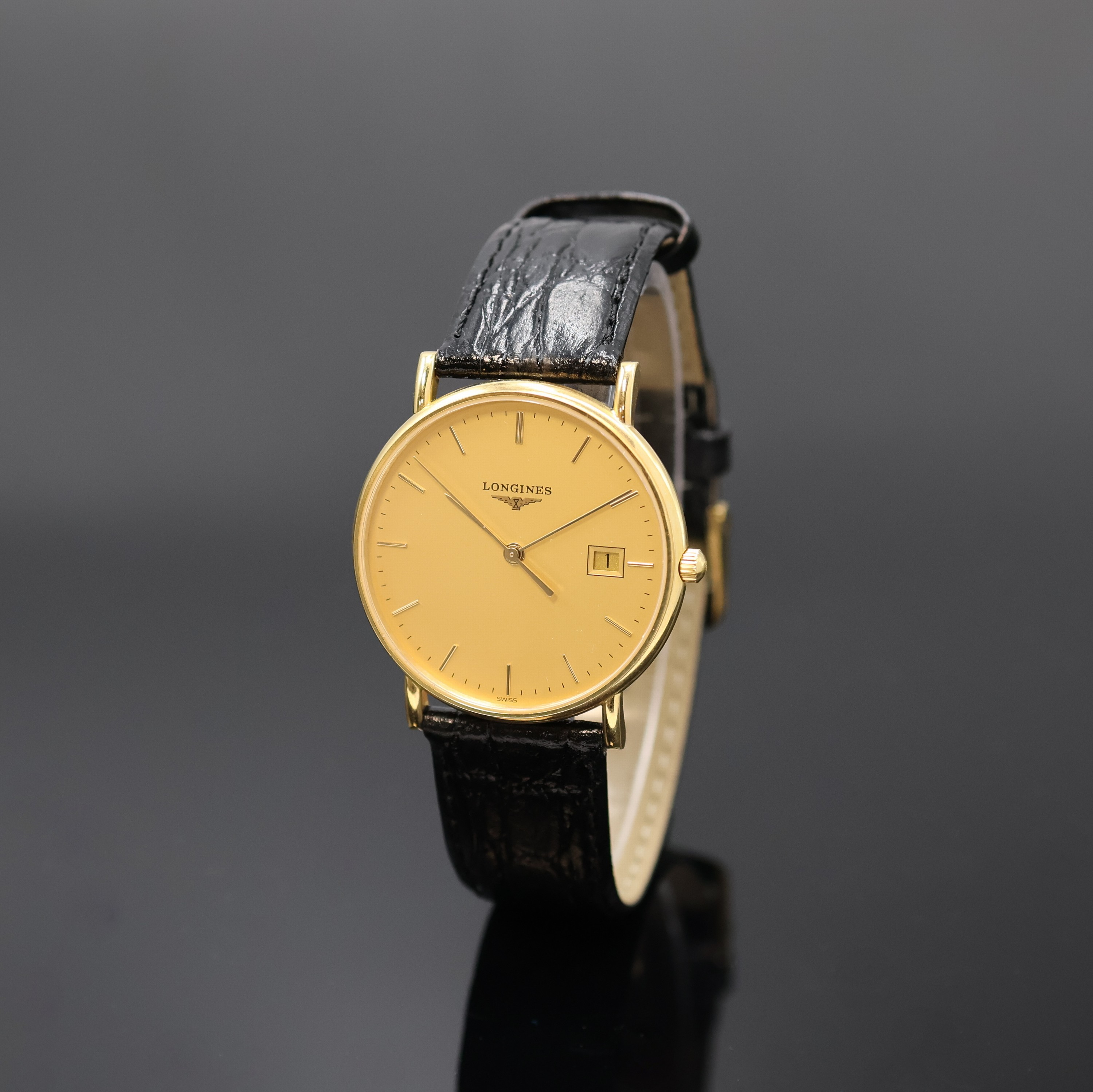 LONGINES Armbanduhr in GG 750/000, quarz, Schweiz um 2000, 2-teil. Geh., Boden aufgedr., gold. Zifferbl. m. aufges. Indizes, Anz. v. Std., Min., ...