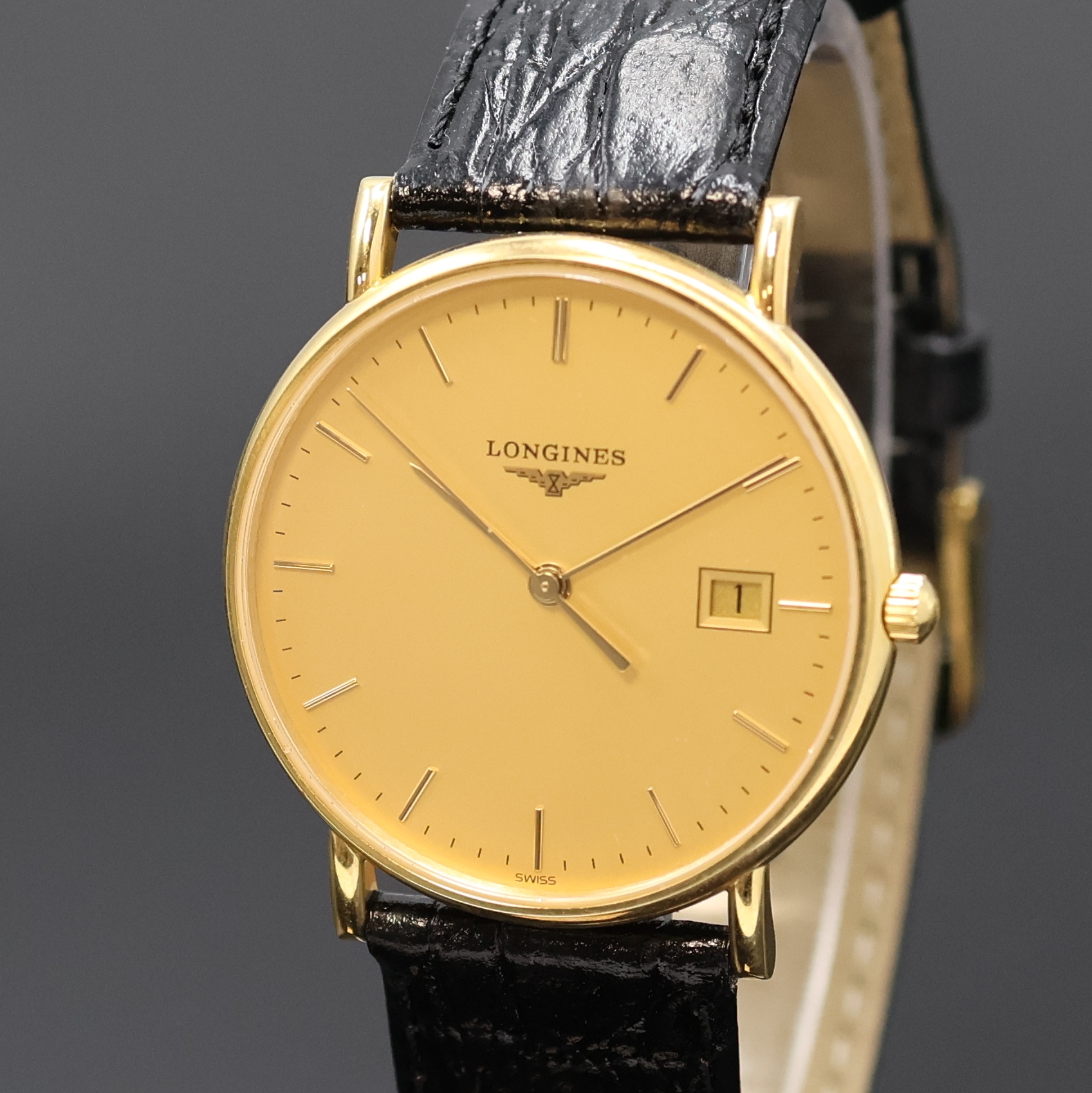 Detail a: LONGINES Armbanduhr in GG 750/000, quarz, Schweiz um 2000, 2-teil. Geh., Boden aufgedr., gold. Zifferbl. m. aufges. Indizes, Anz. v. Std., Min., ...