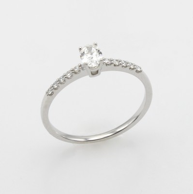 Image Ring mit Diamant und Brillanten, WG 585/000,oval facett. Diam. ca. 0.30 ct u. ...