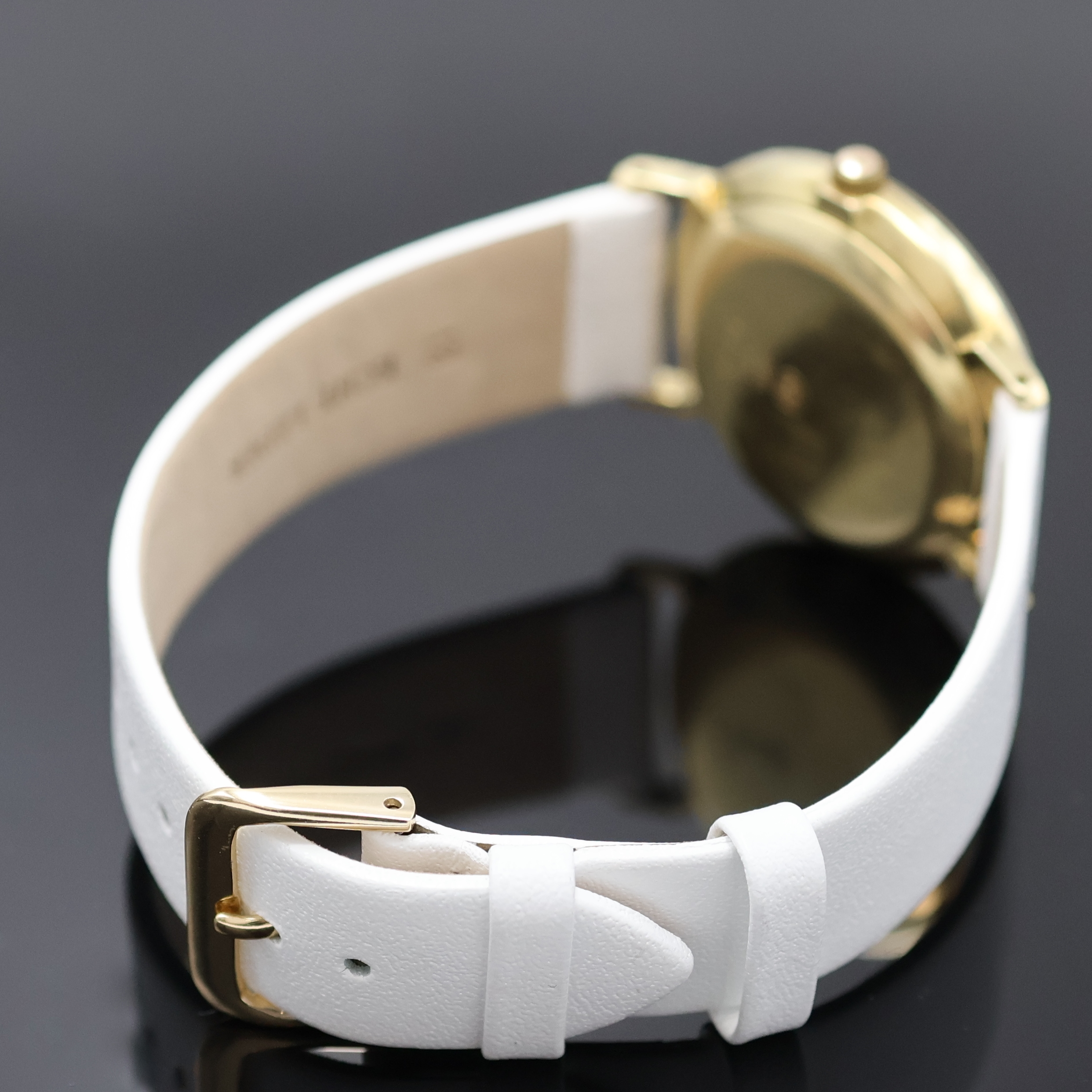 Detail b: LANCO Herrenarmbanduhr in GG 585/000, Schweiz um 1965, Automatik, Boden u. Glasrand gedr., goldfarb. Zifferbl. m. gold. Std.-Ind. u. gold. Zeiger, ...