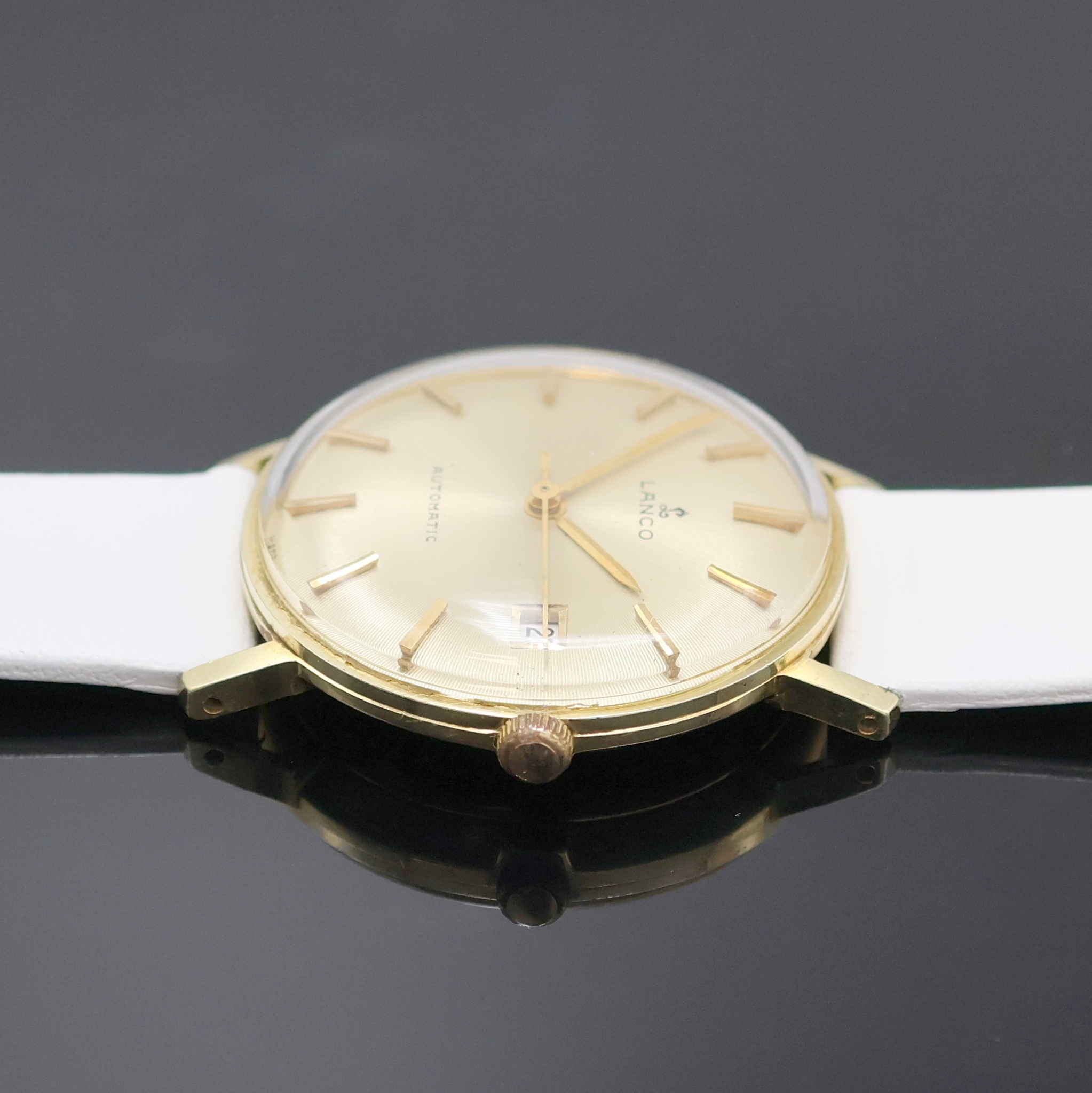 Detail c: LANCO Herrenarmbanduhr in GG 585/000, Schweiz um 1965, Automatik, Boden u. Glasrand gedr., goldfarb. Zifferbl. m. gold. Std.-Ind. u. gold. Zeiger, ...