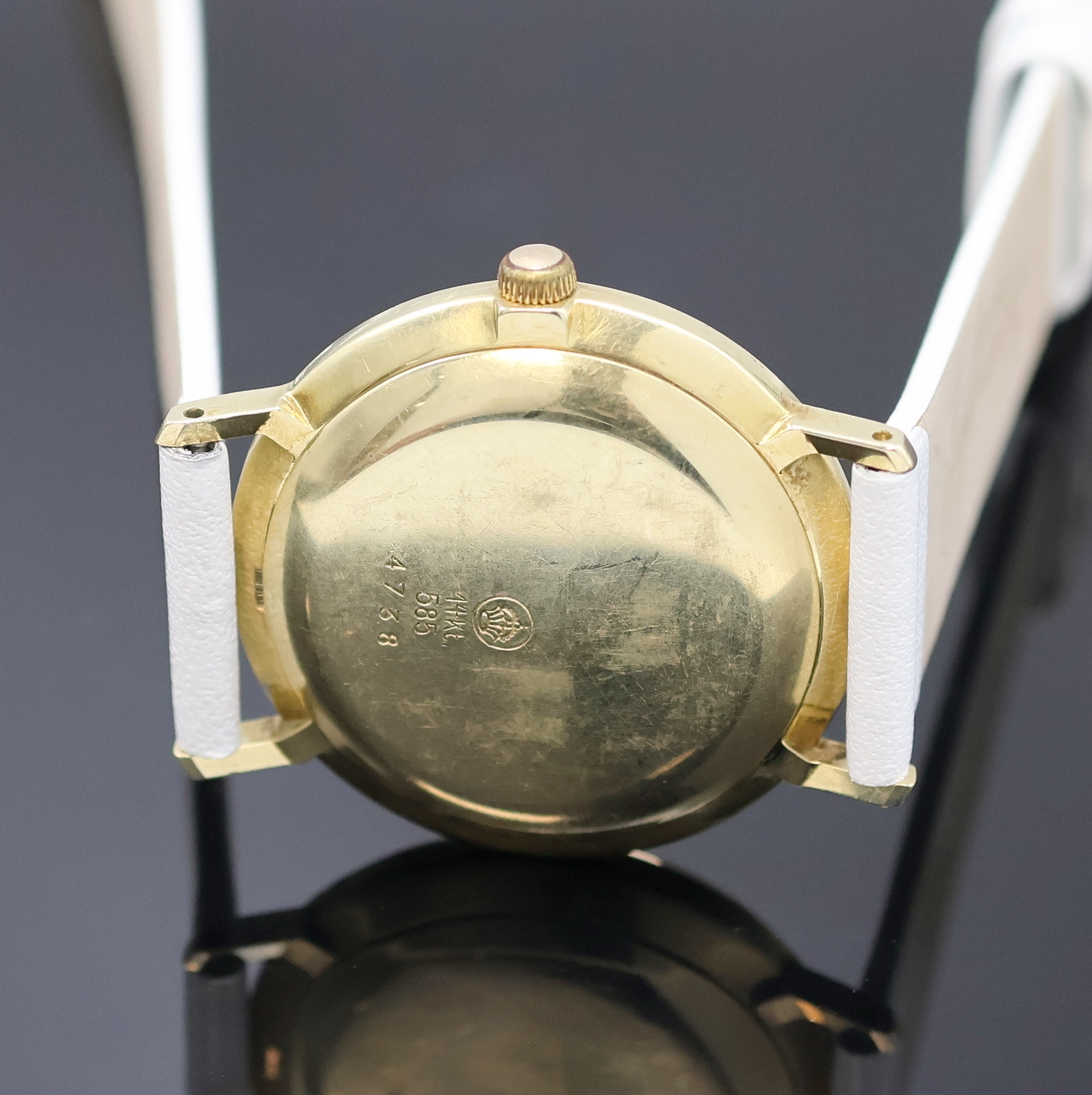 Detail d: LANCO Herrenarmbanduhr in GG 585/000, Schweiz um 1965, Automatik, Boden u. Glasrand gedr., goldfarb. Zifferbl. m. gold. Std.-Ind. u. gold. Zeiger, ...