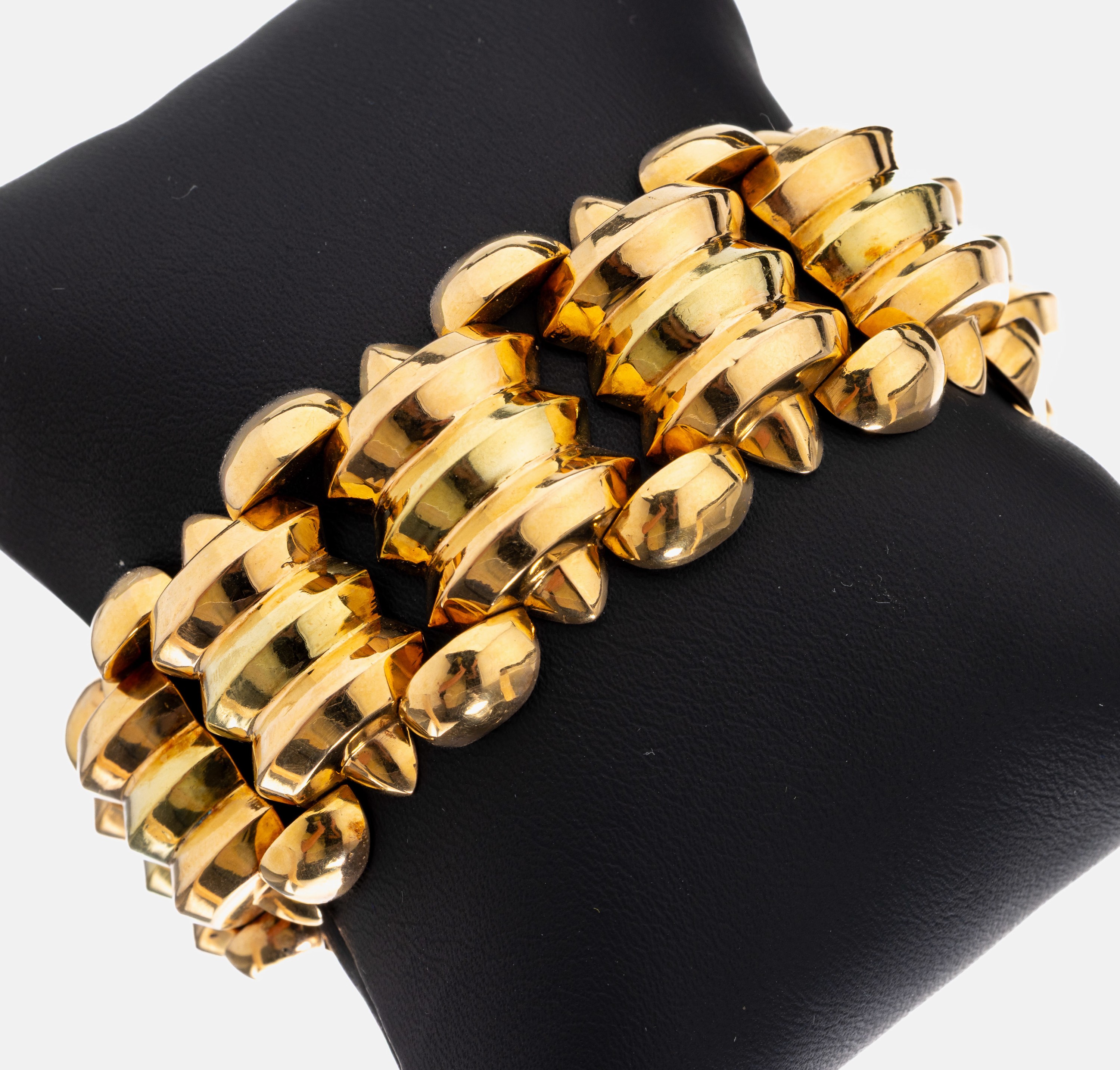 18 kt Gold Armband, GG 750/000 gepr., geom.Formen, pol., L. ca. 18.5 cm, Kastenschloss mit Sicherheitskettchen, ca. 61.3 g