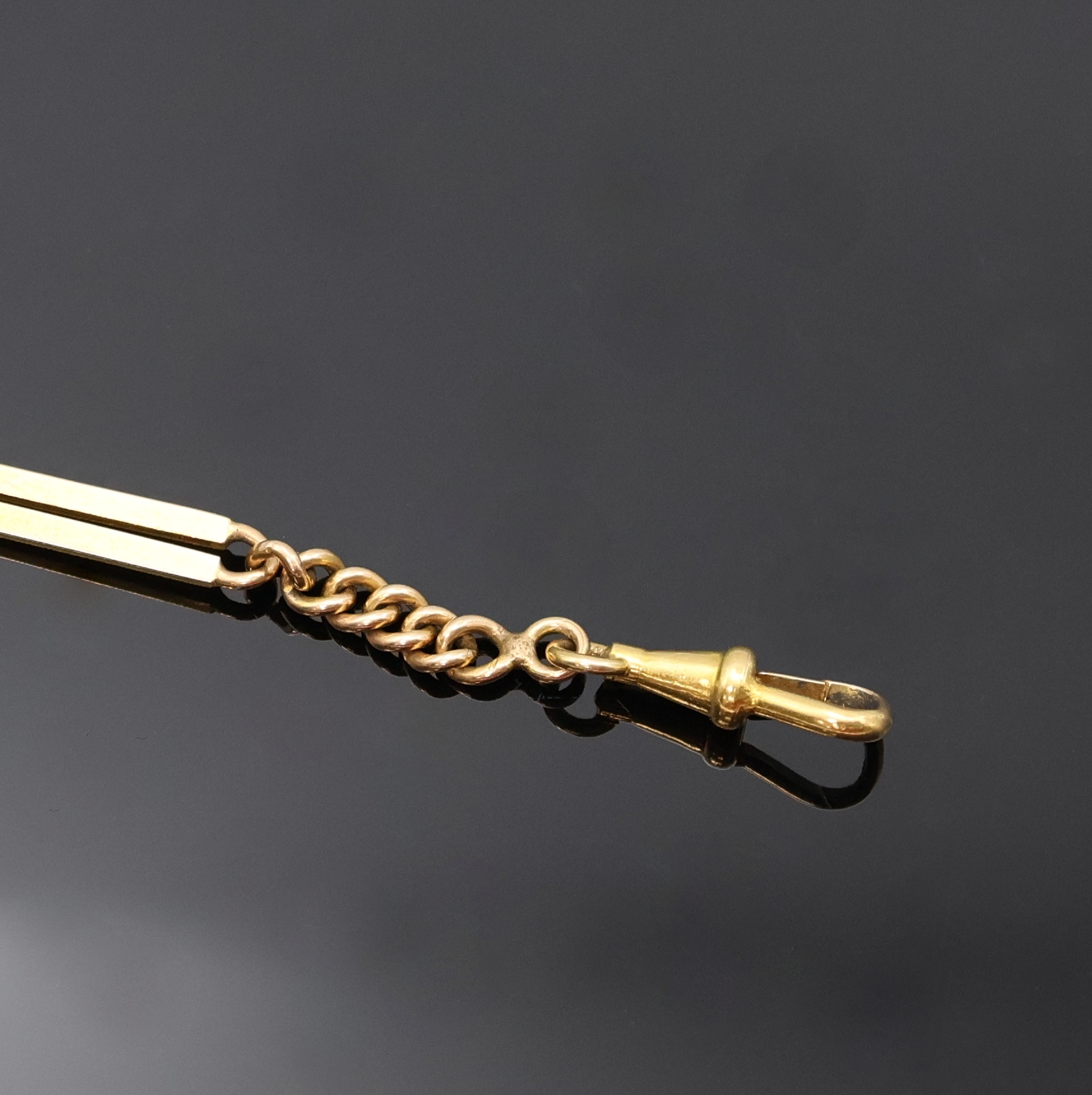Detail a: Taschenuhrkette in GG 585/000, mit Federring und Karabiner, L. ca. 30,5 cm, Gew. ca. 22g, aus Sammlungsauflösung