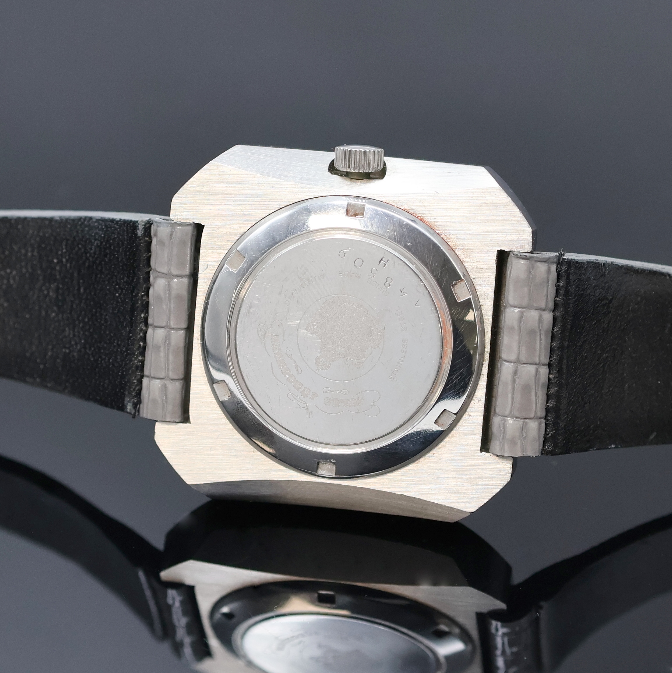 Detail c: JÜRGENSEN große Herrenarmbanduhr in Stahl, Schweiz um 1975, Automatik, Boden verschr., silb. Zifferbl. m. aufgel. Indizes, Anz. v. Std., Min., ...
