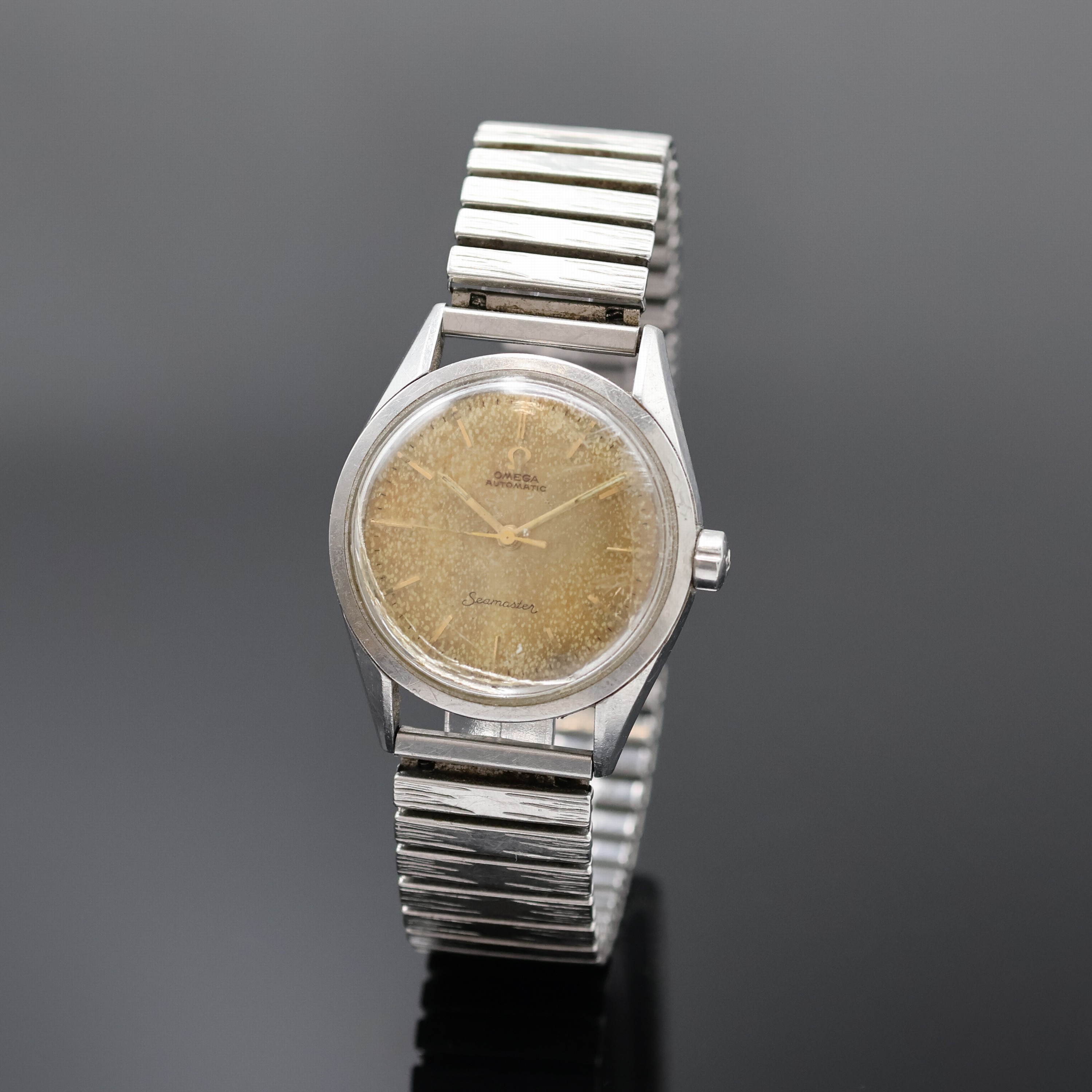 OMEGA Seamaster Armbanduhr Referenz 2802-1 SC, Schweiz um 1957, Automatik, aufgedr. Boden m. grav. Datum 9.6.57, Zifferbl. pat./fl., aufges. gold. ...