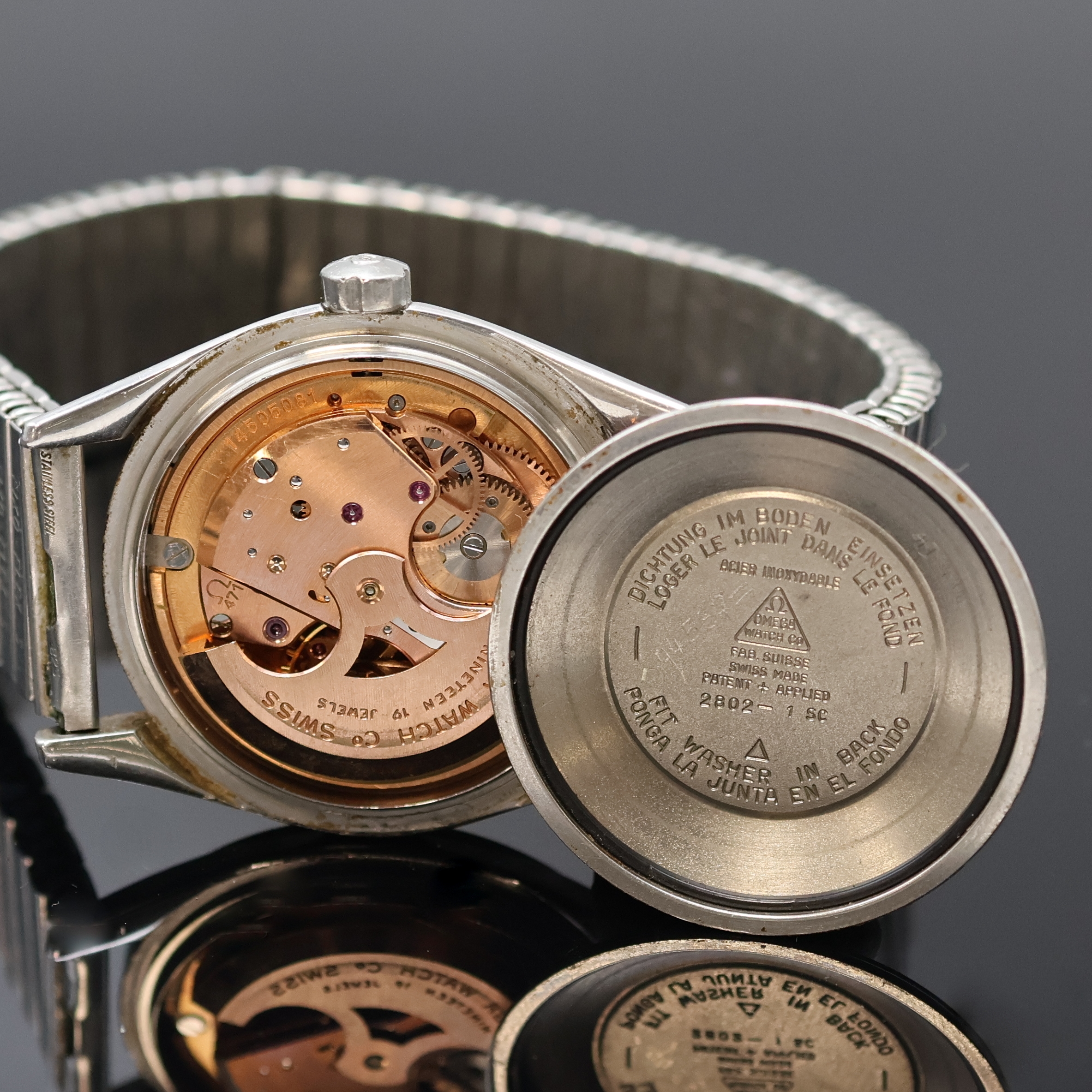 Detail f: OMEGA Seamaster Armbanduhr Referenz 2802-1 SC, Schweiz um 1957, Automatik, aufgedr. Boden m. grav. Datum 9.6.57, Zifferbl. pat./fl., aufges. gold. ...