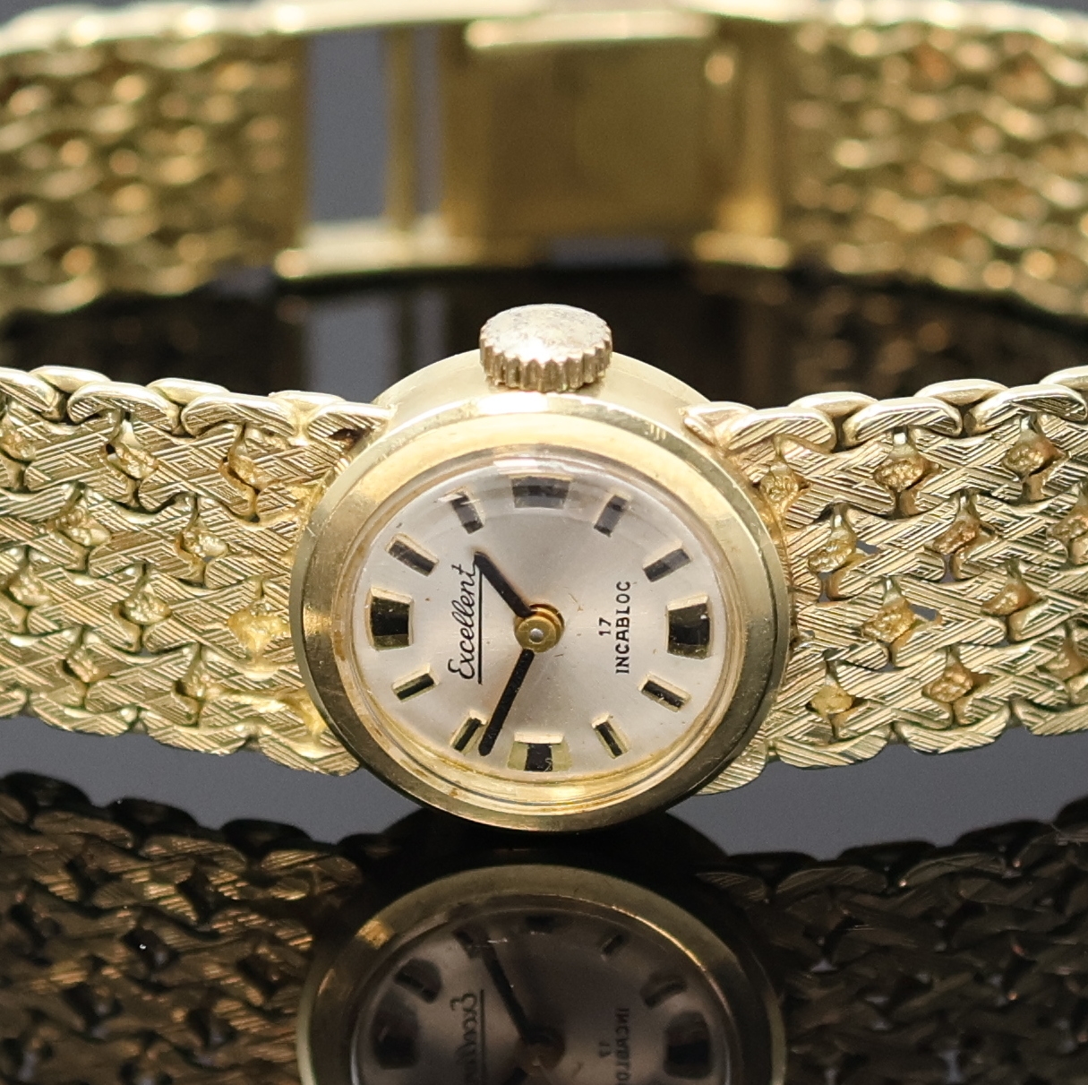 Detail a: EXCELLENT Damenarmbanduhr in GG 585/000, Schweiz um 1965, Handaufzug, Boden aufgedr., Goldband, silb. Zifferbl. m. aufges. Std.- Ind., schwarze ...