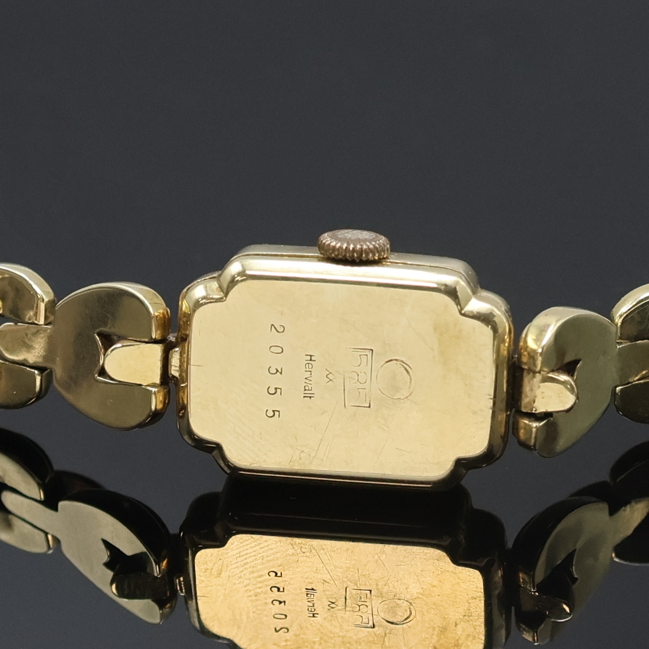 Detail c: HERWALT Damenarmbanduhr in GG 585/000, Schweiz um 1955, Handaufzug, Scharnierboden, schwarzes Zifferbl. m. arab. Zahlen u. Strich-Ind., gold. Zeiger, ...