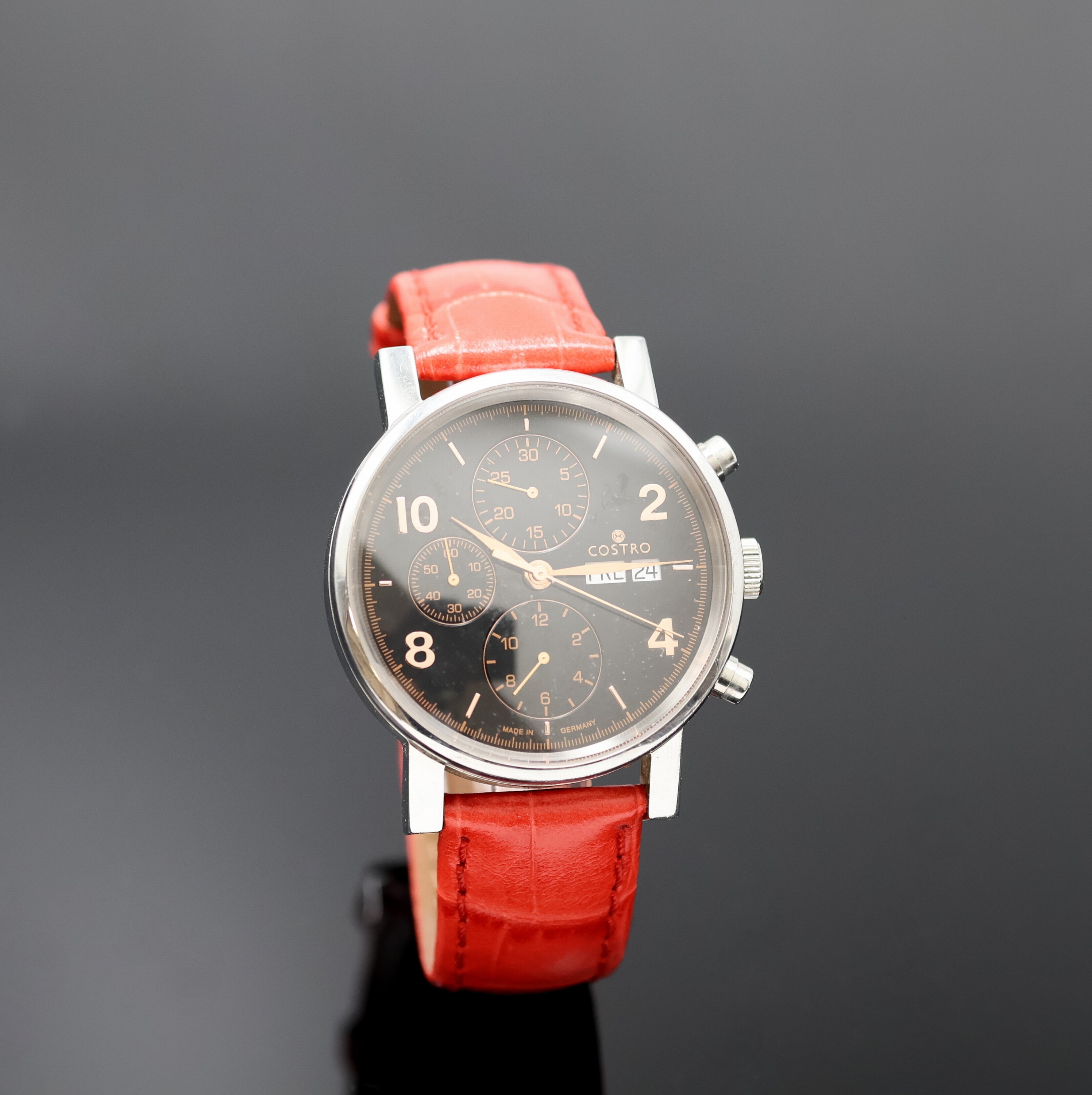 Detail b: COSTRO Armbandchronograph, Automatik, beids. vergl., Lederband m. Dornschl., schwarzes Zifferbl. m. arab. Zahlen, kl. Sek., 30 Min- Zähler, 12 ...