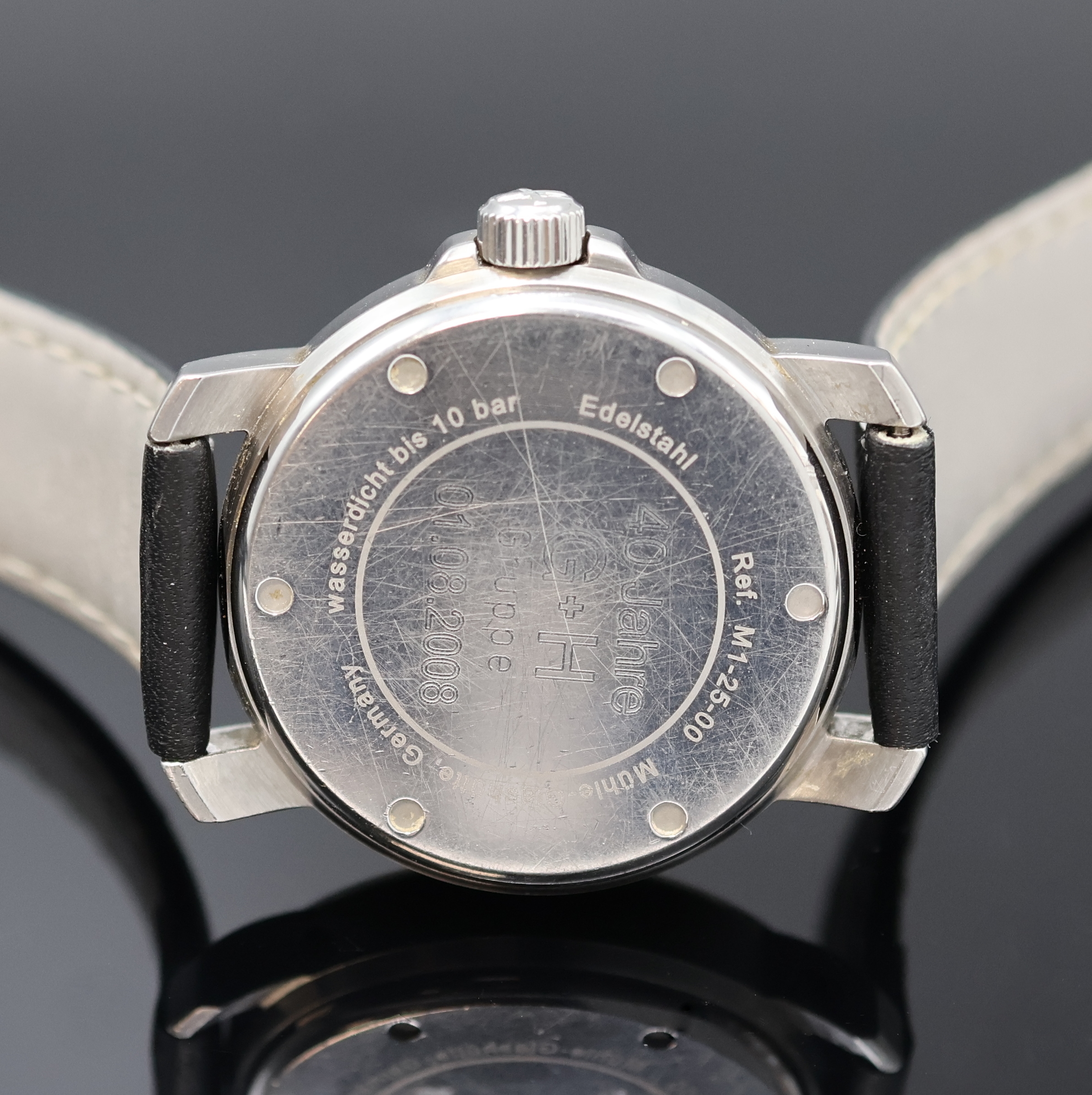 Detail e: NAUTISCHE INSTRUMENTE Mühle Glashütte Armbanduhr Referenz M1-25-00, Deutschland um 2005, Automatik, Edelstahlgeh., Krone und Boden mit ...