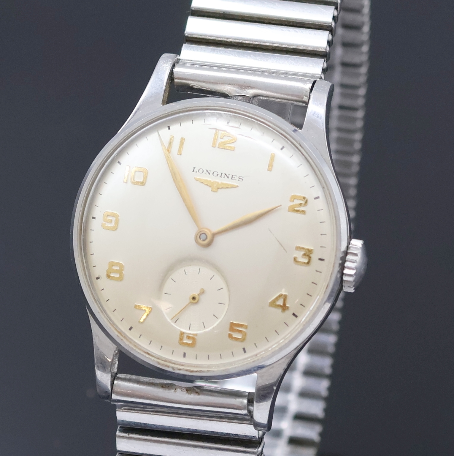 Detail a: LONGINES Herrenarmbanduhr Referenz 4858 12, Handaufzug, Schweiz um 1952, 3-teil. Stahlgeh. an Fixo-Flex Band, Boden und Glasrand aufgedr., silb. ...